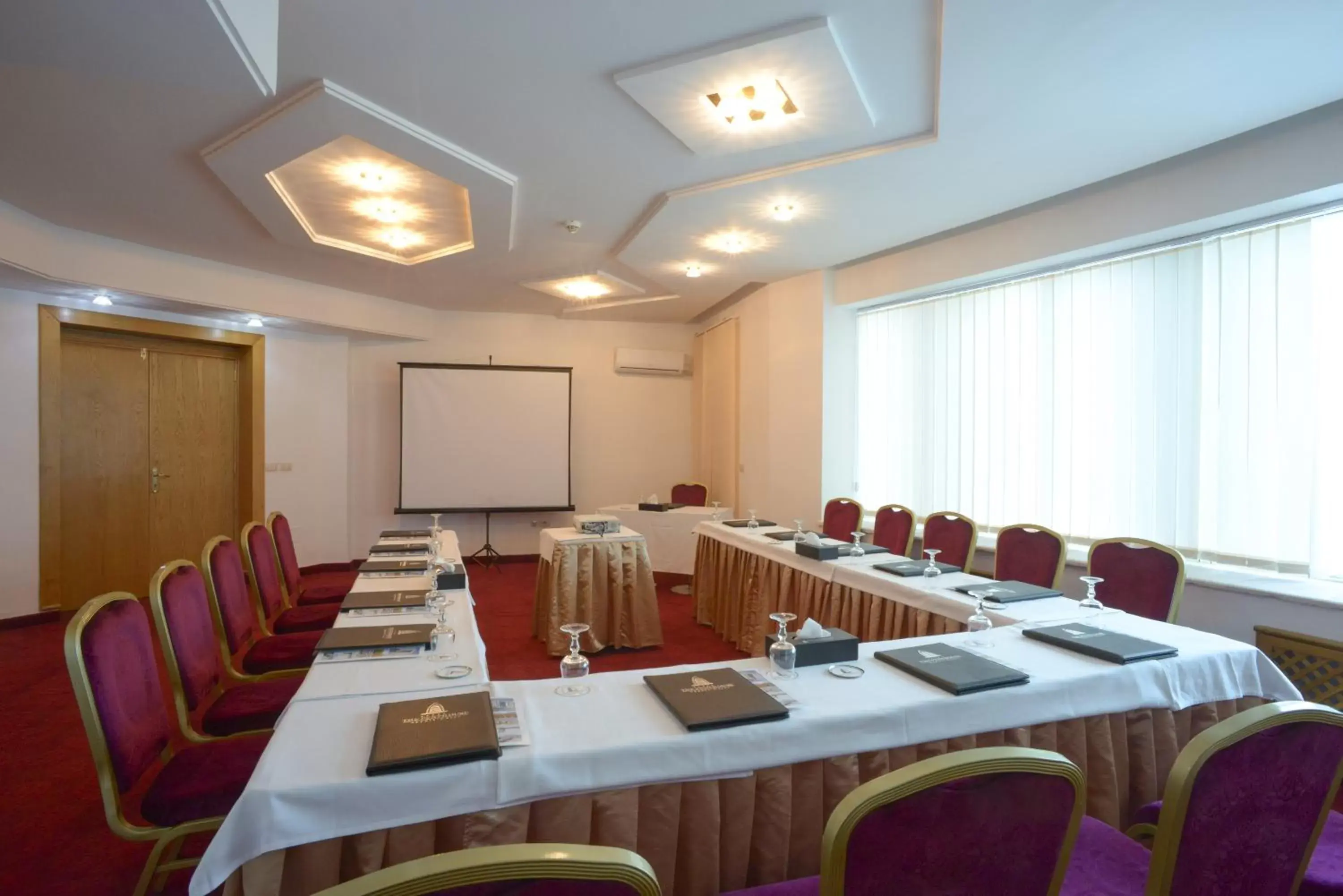 Meeting/conference room in The Penthouse Suites Hotel