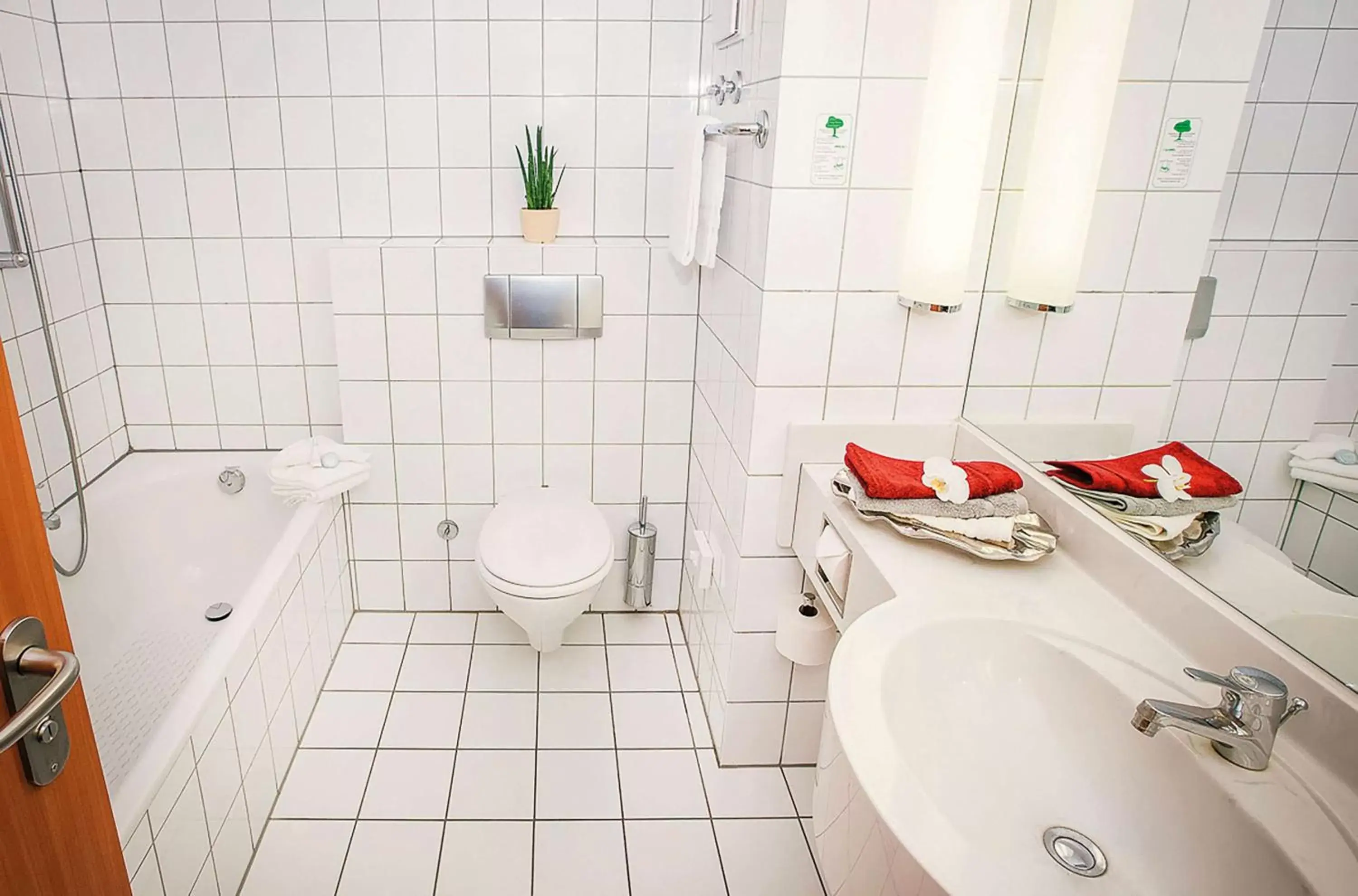 TV and multimedia, Bathroom in Vienna House Easy by Wyndham Limburg