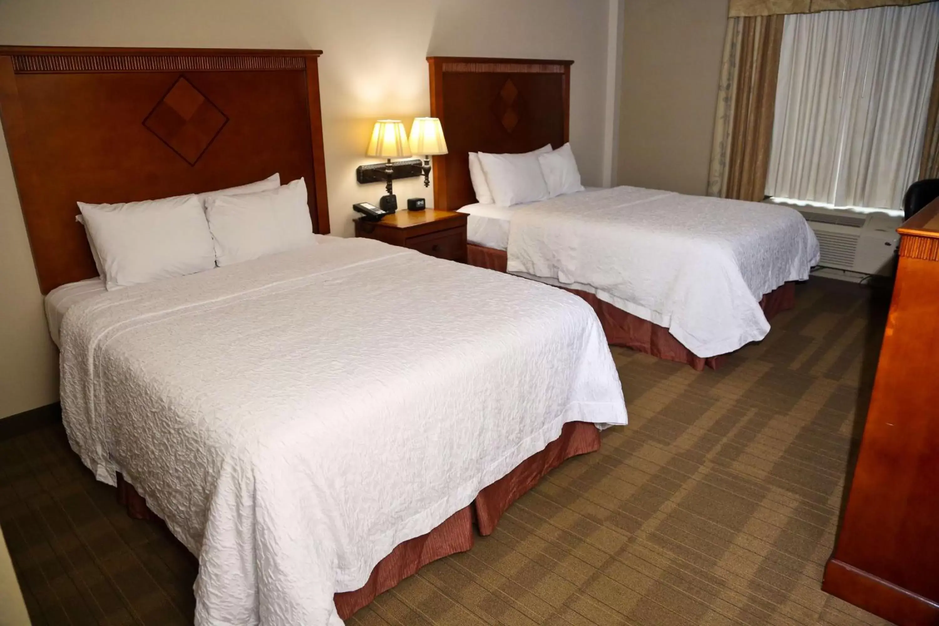 Bed in Hampton Inn & Suites Jennings