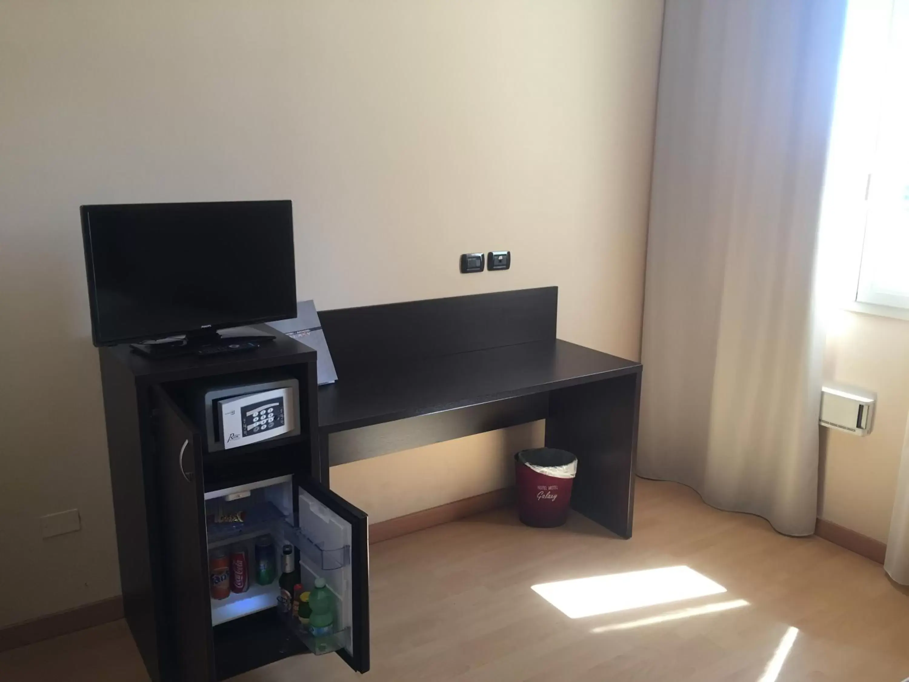 Seating area, TV/Entertainment Center in Hotel Motel Galaxy Reggio Emilia