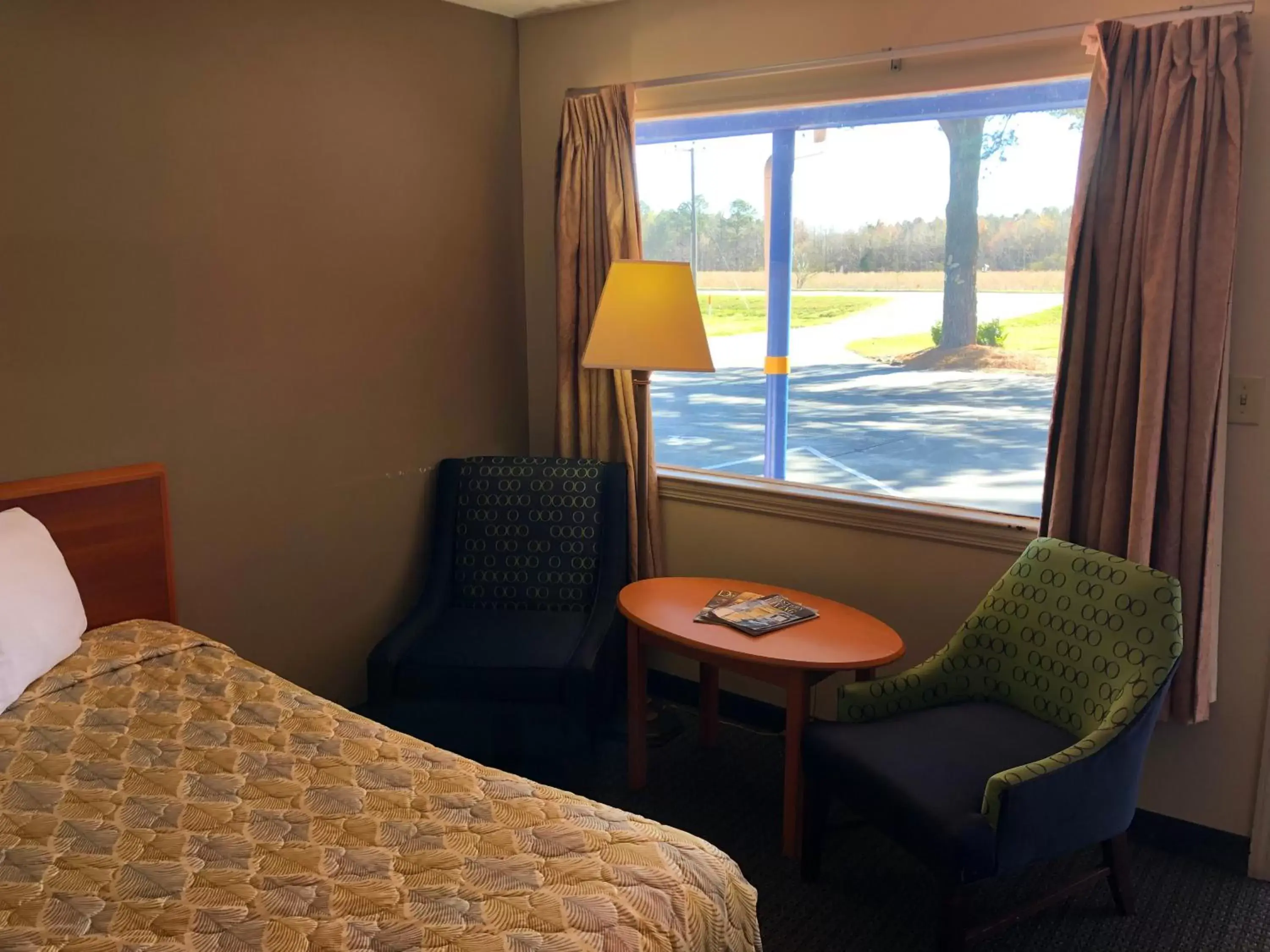 View (from property/room), Bed in SPORTSMAN's INN - Call 252-793-3095