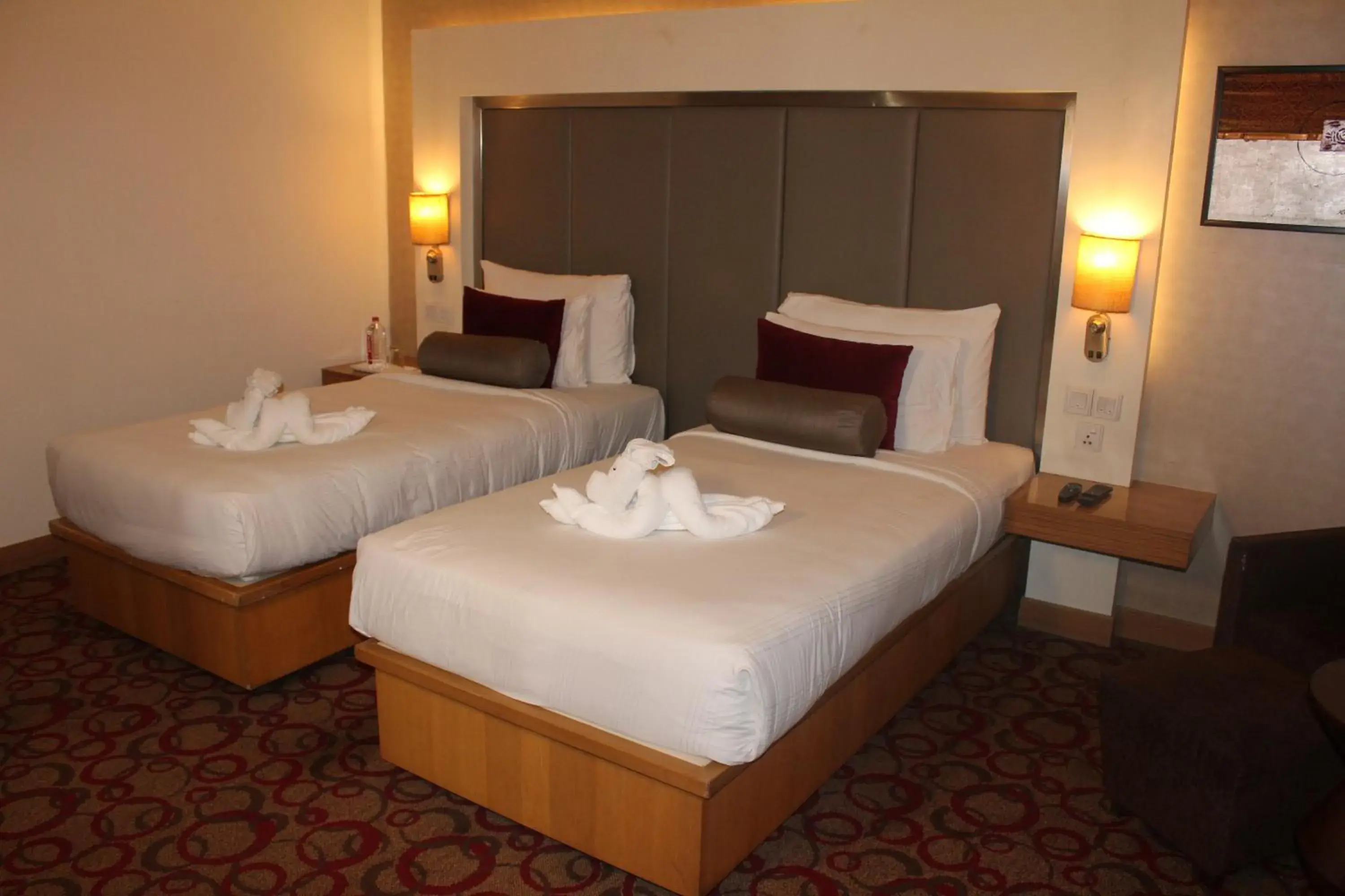 Bed in Pride Plaza Hotel, Ahmedabad