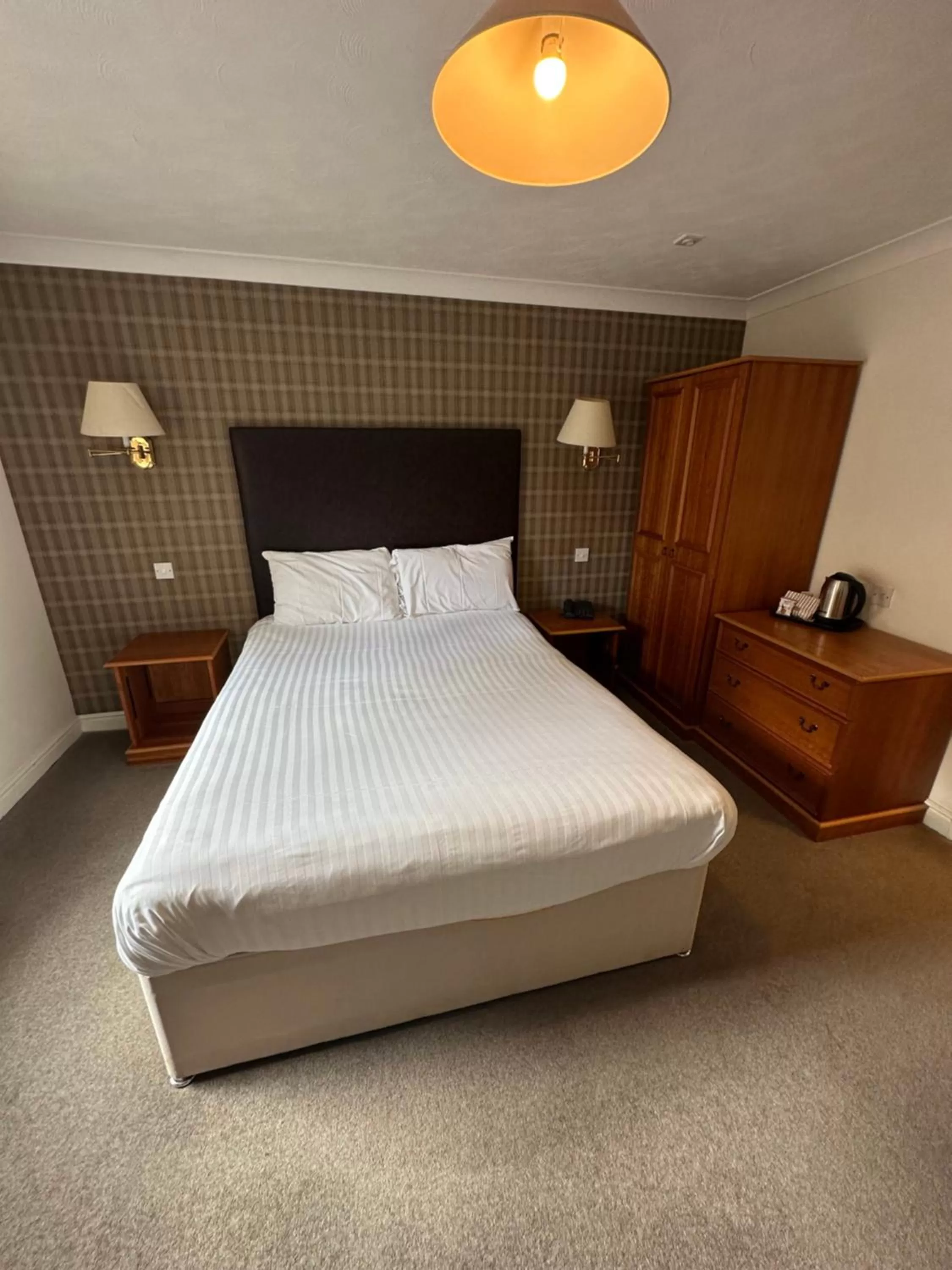 Bedroom in The Gables Hotel