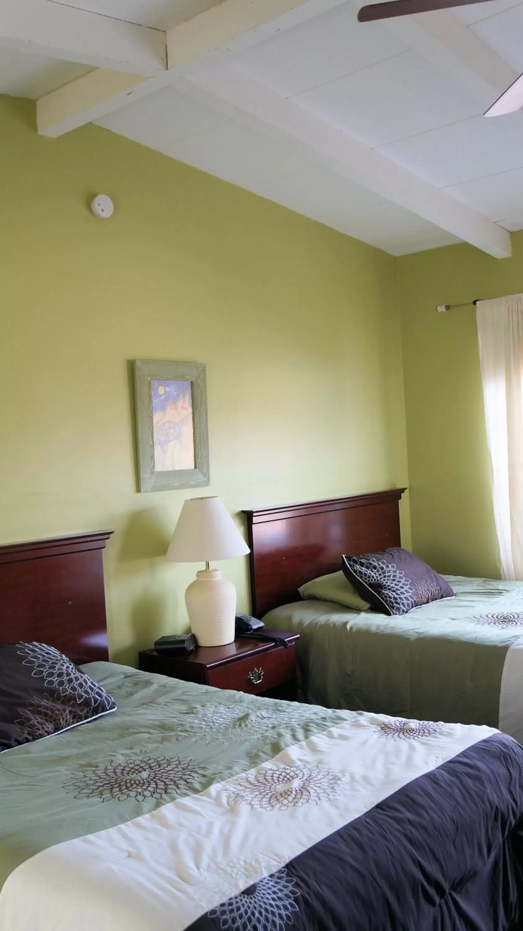 Bedroom, Bed in Harmony Motel