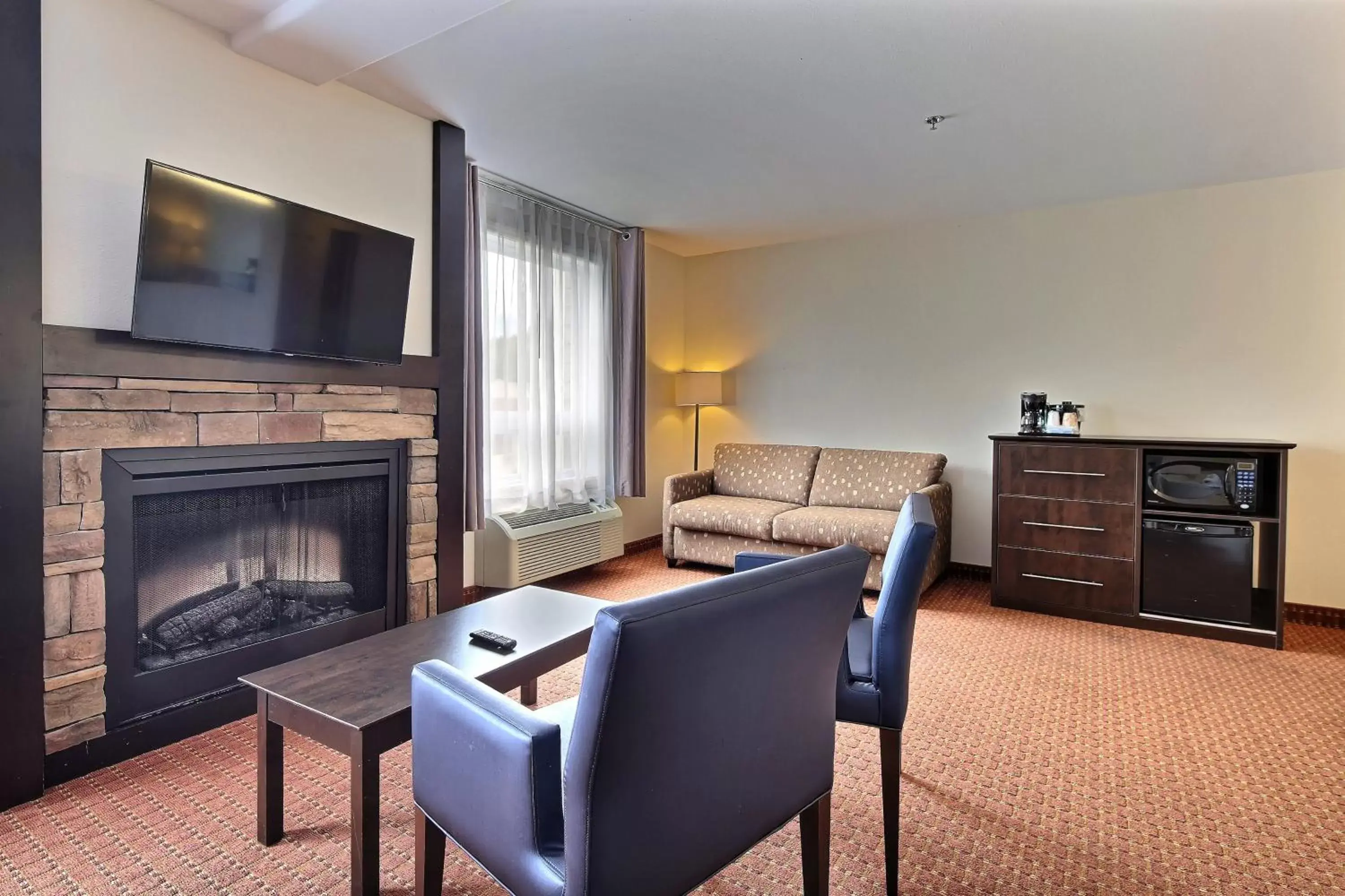 Living room, Seating Area in Super 8 by Wyndham Quebec City