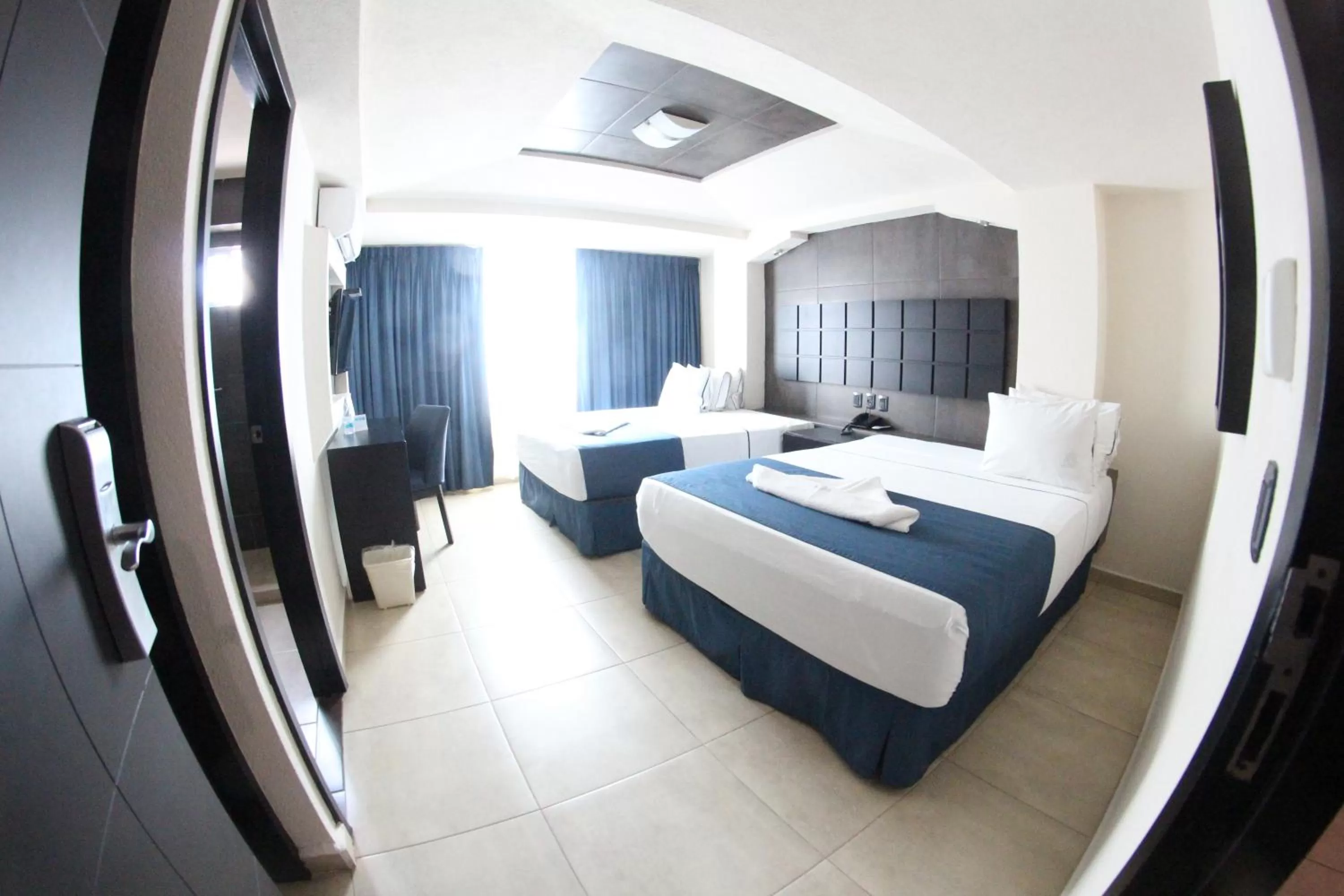 Photo of the whole room, Bed in Hotel Portonovo Plaza Malecon