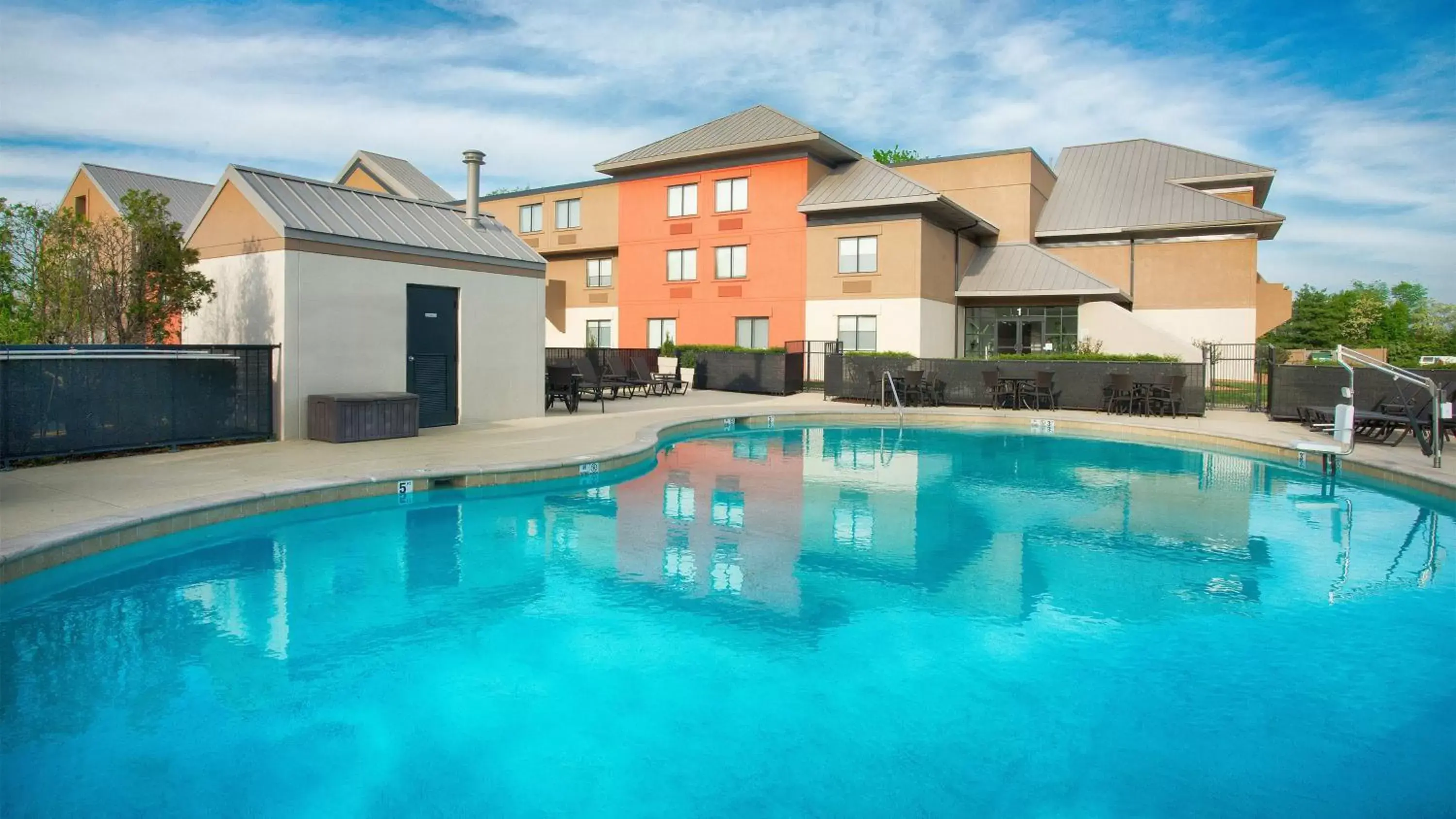 Swimming pool, Property Building in Holiday Inn Express Nashville Airport, an IHG Hotel