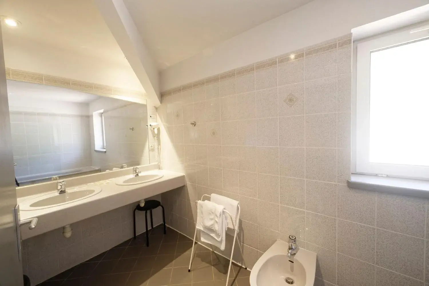 Bathroom in Hôtel Le Lons