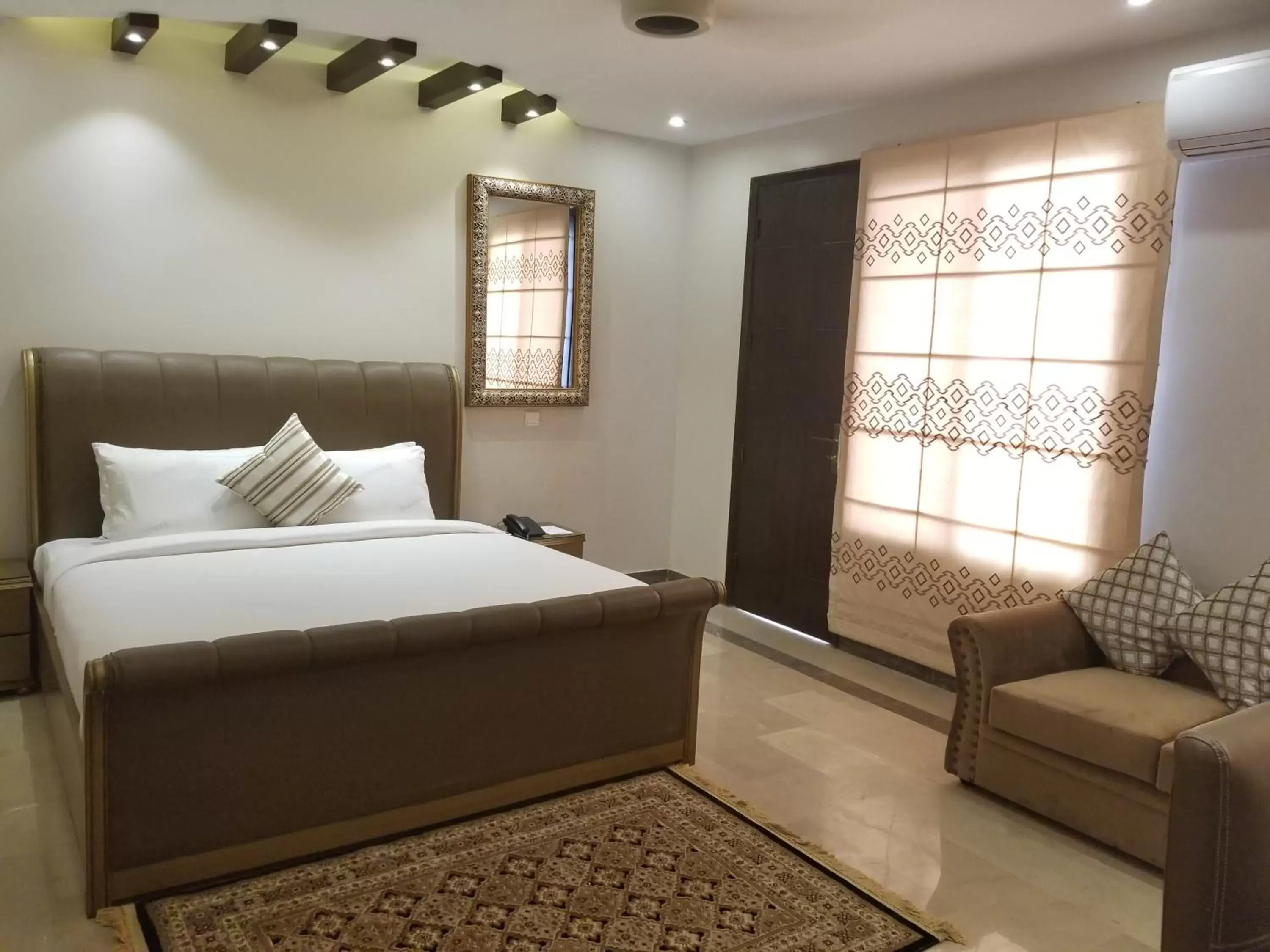 Bed in Zifan Hotel & Suites