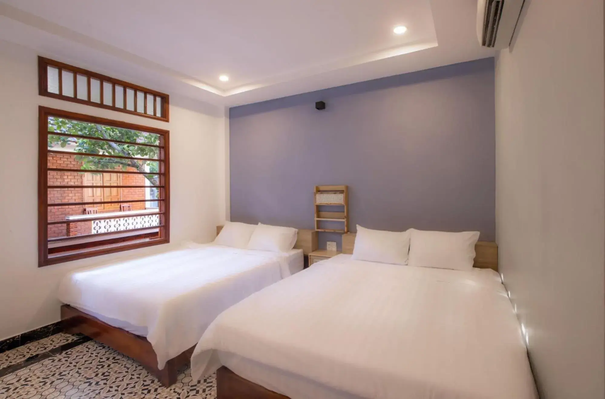 Bed in Familia Resort