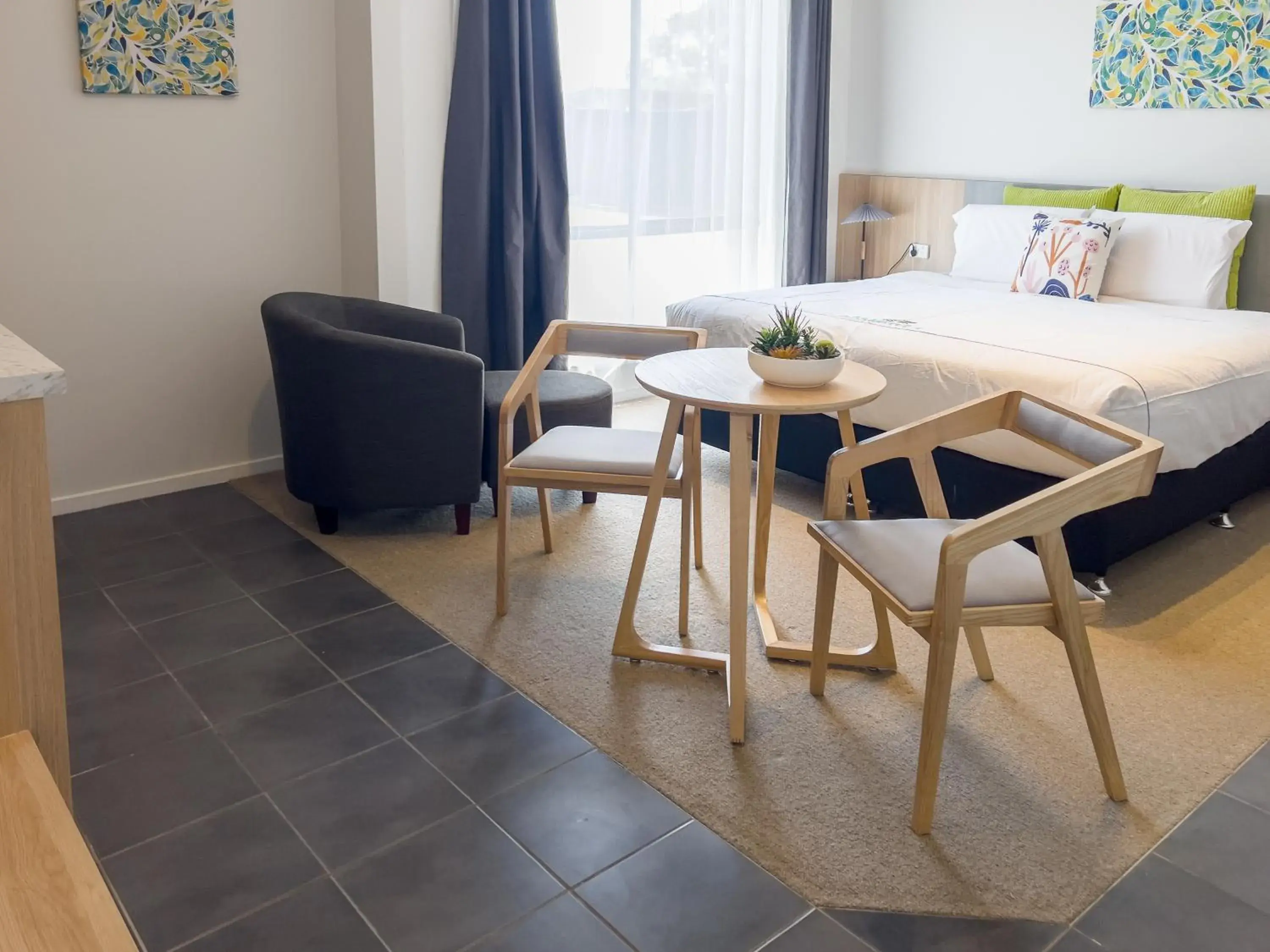 Bedroom, Dining Area in A1 Motels and Apartments Port Fairy