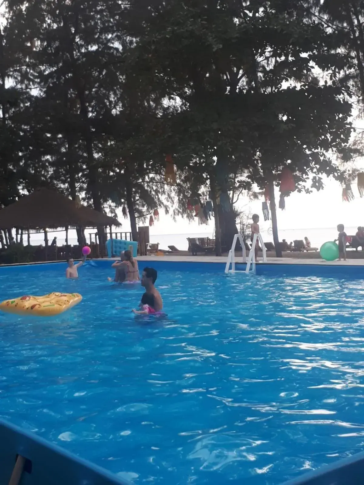 People, Swimming Pool in Eco Lanta Hideaway Beach Resort