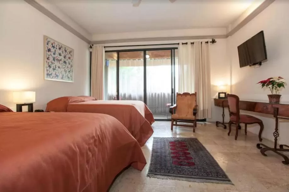 Bed in Orchidelirium Casa Hotel & Salud Estética