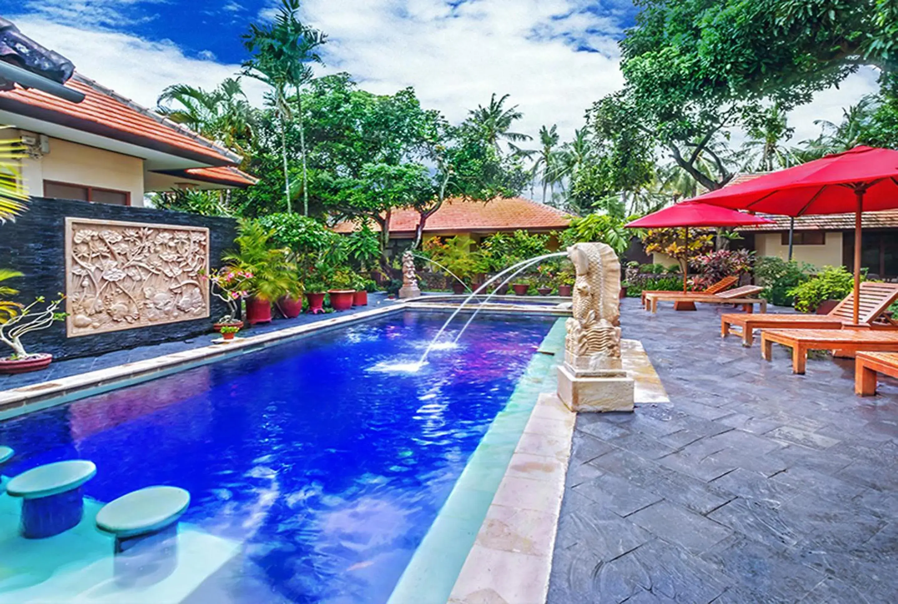 Pool view, Swimming Pool in Yulia Beach Inn Kuta