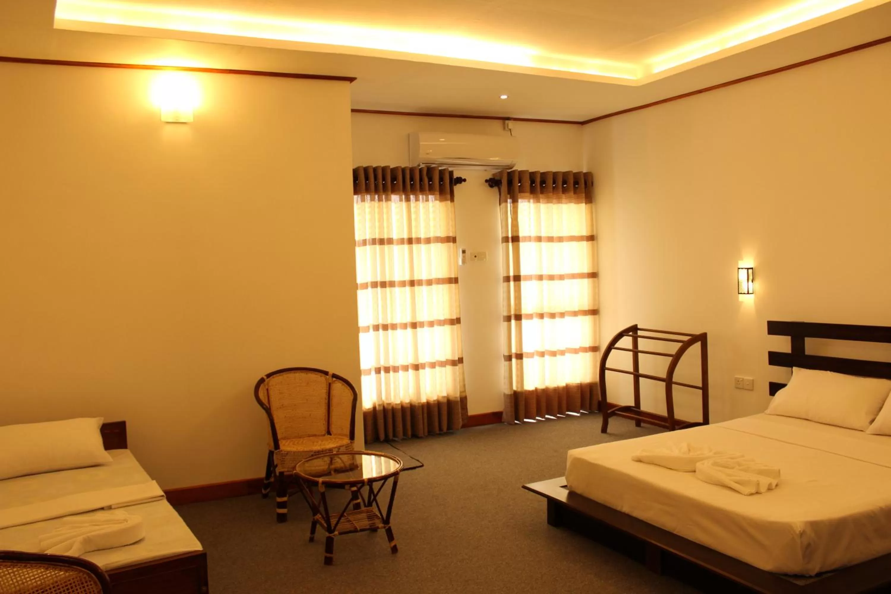 Bed in Nico Lagoon Hotel