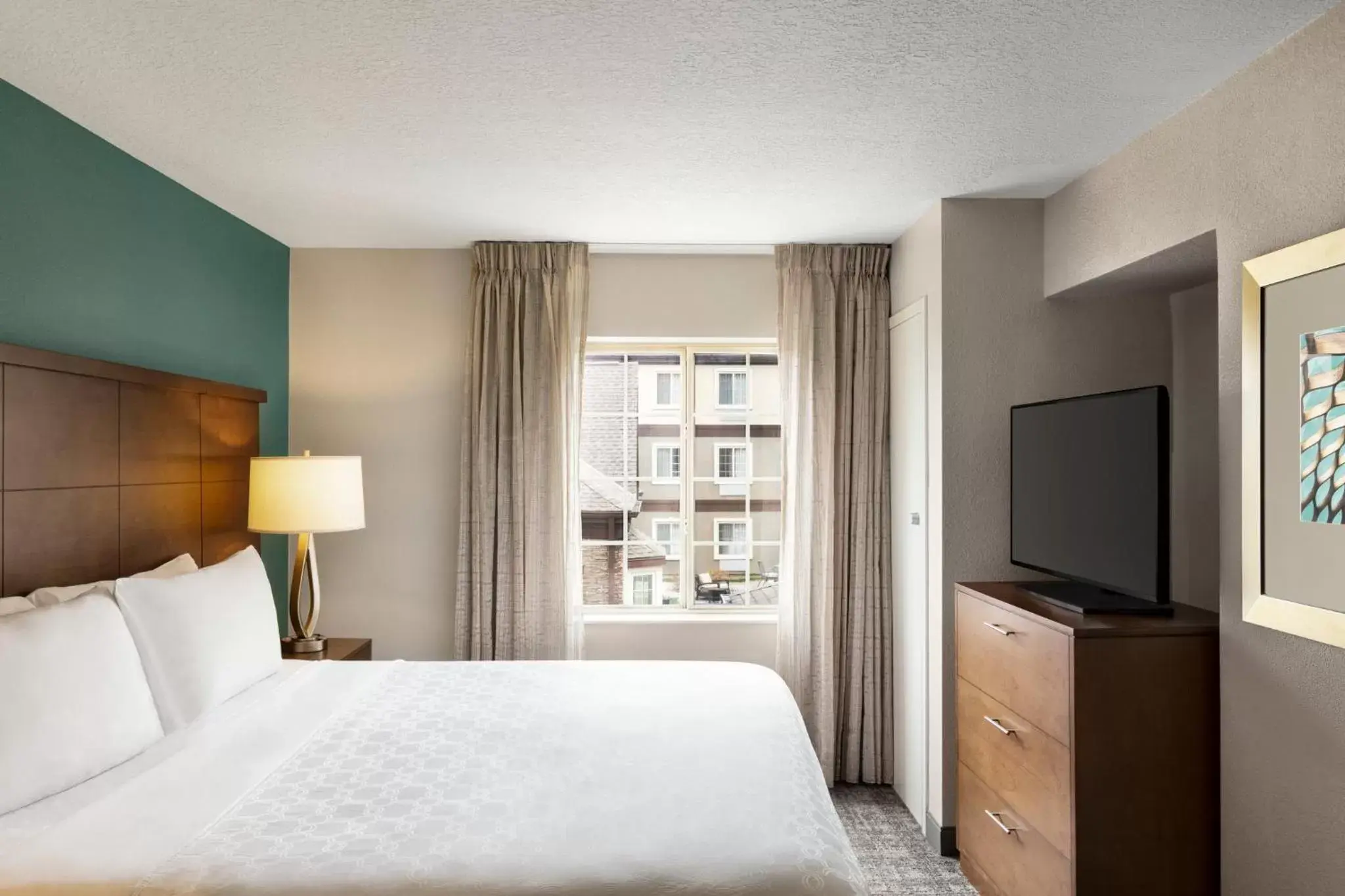 Photo of the whole room, Bed in Staybridge Suites Fort Wayne, an IHG Hotel