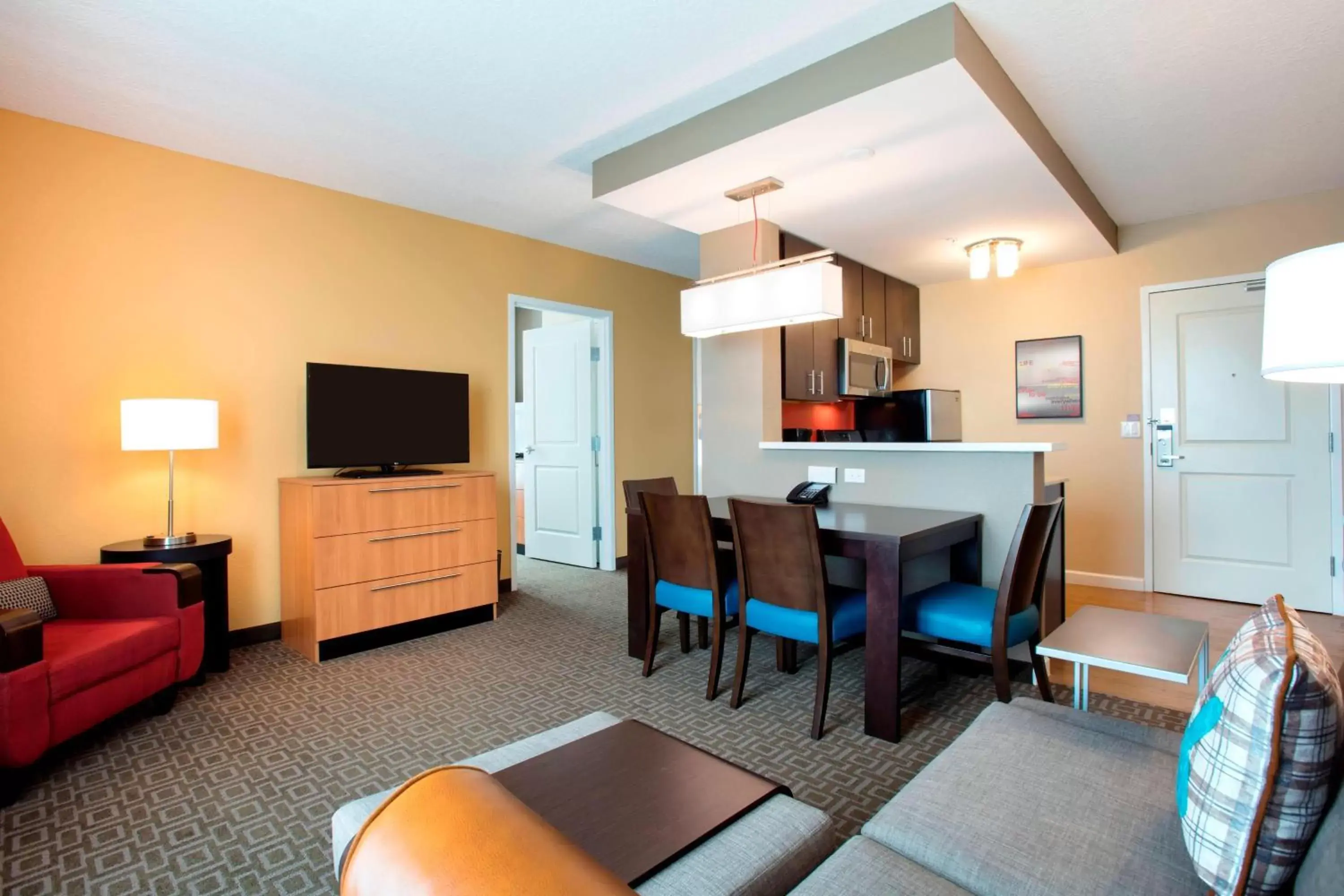 Bedroom, Dining Area in TownePlace Suites Orlando at FLAMINGO CROSSINGS® Town Center/Western Entrance