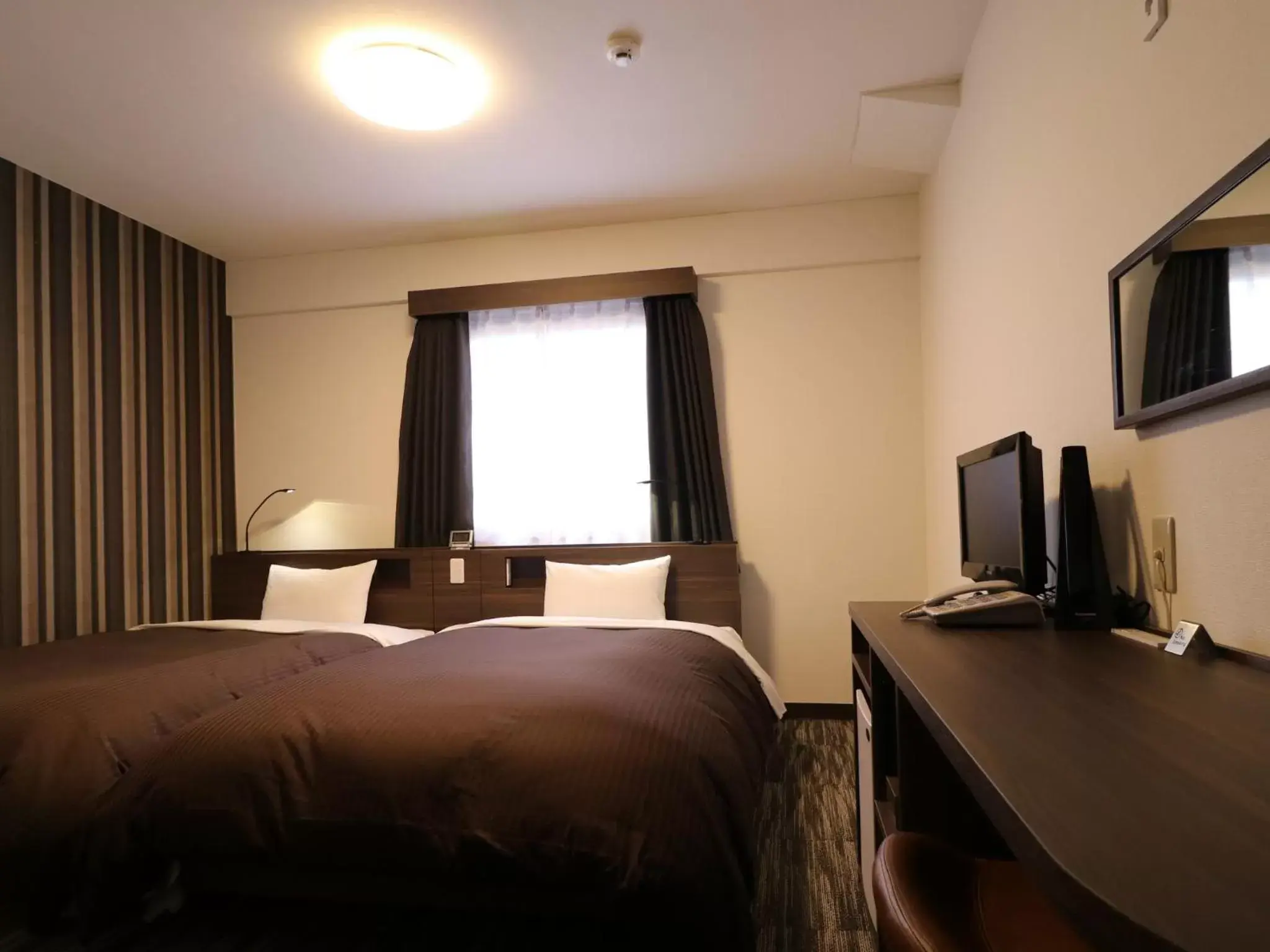 Photo of the whole room, Bed in Odawara Terminal Hotel