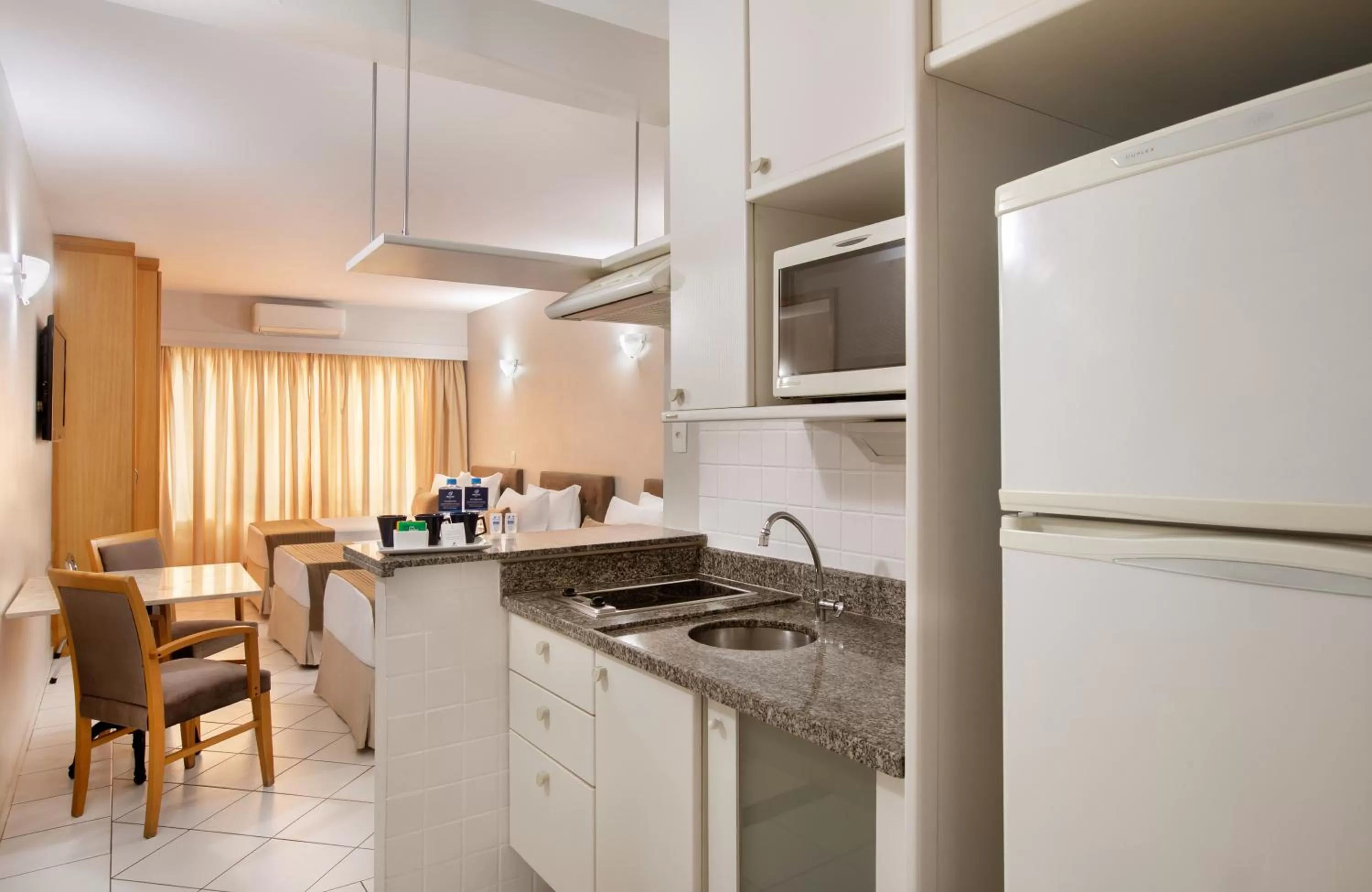 microwave in Plaza Inn American Loft - Barra Funda