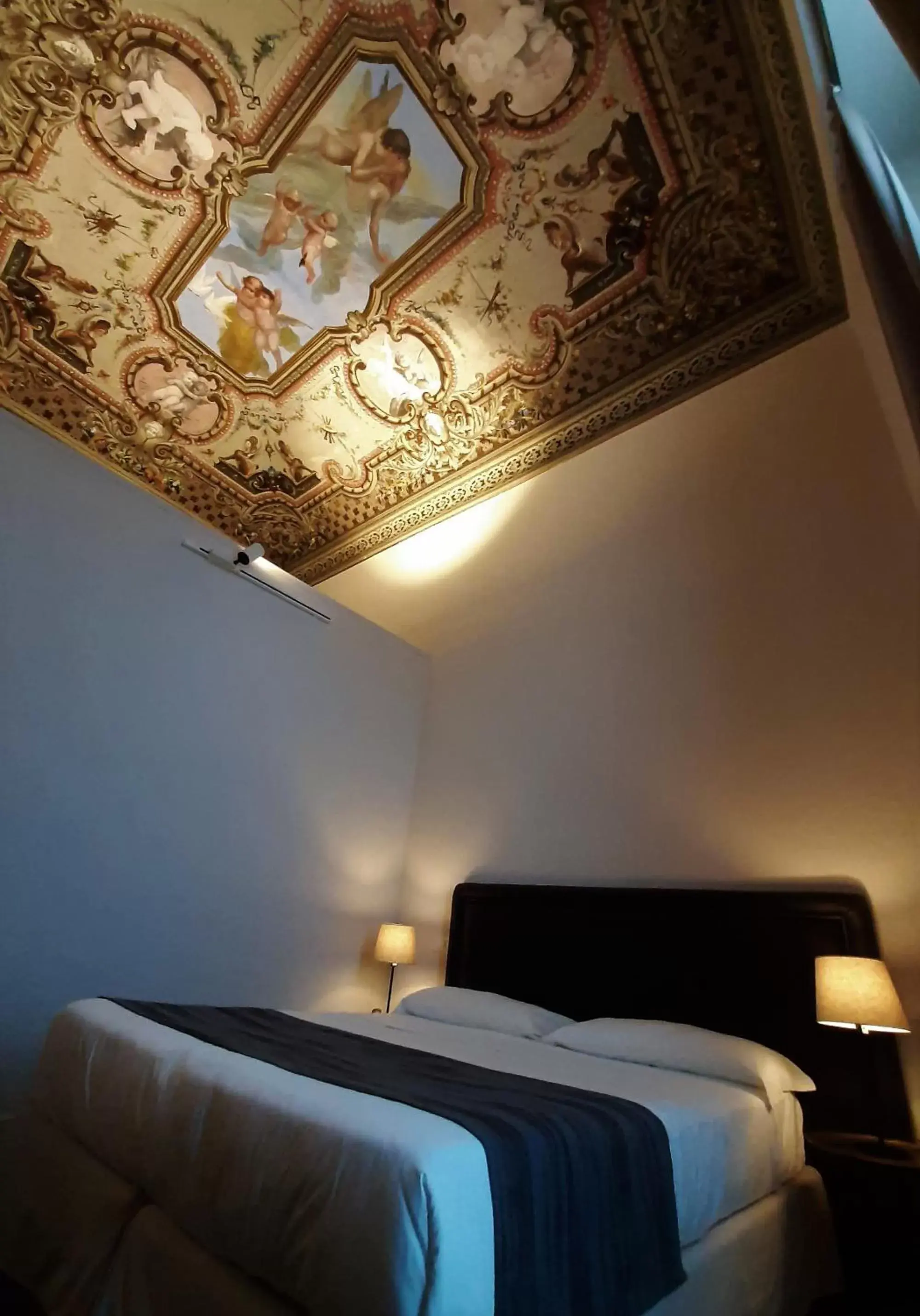 Decorative detail, Bed in Hotel Palazzo Vannoni