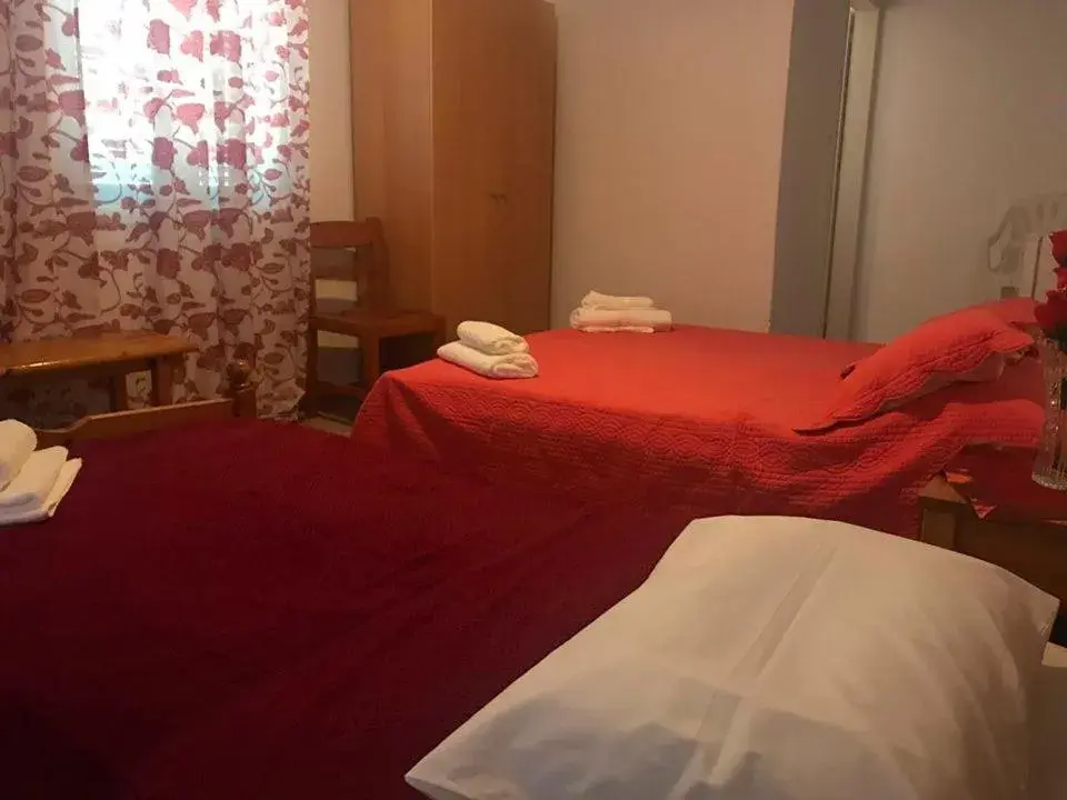 Bed in Hotel Hellas