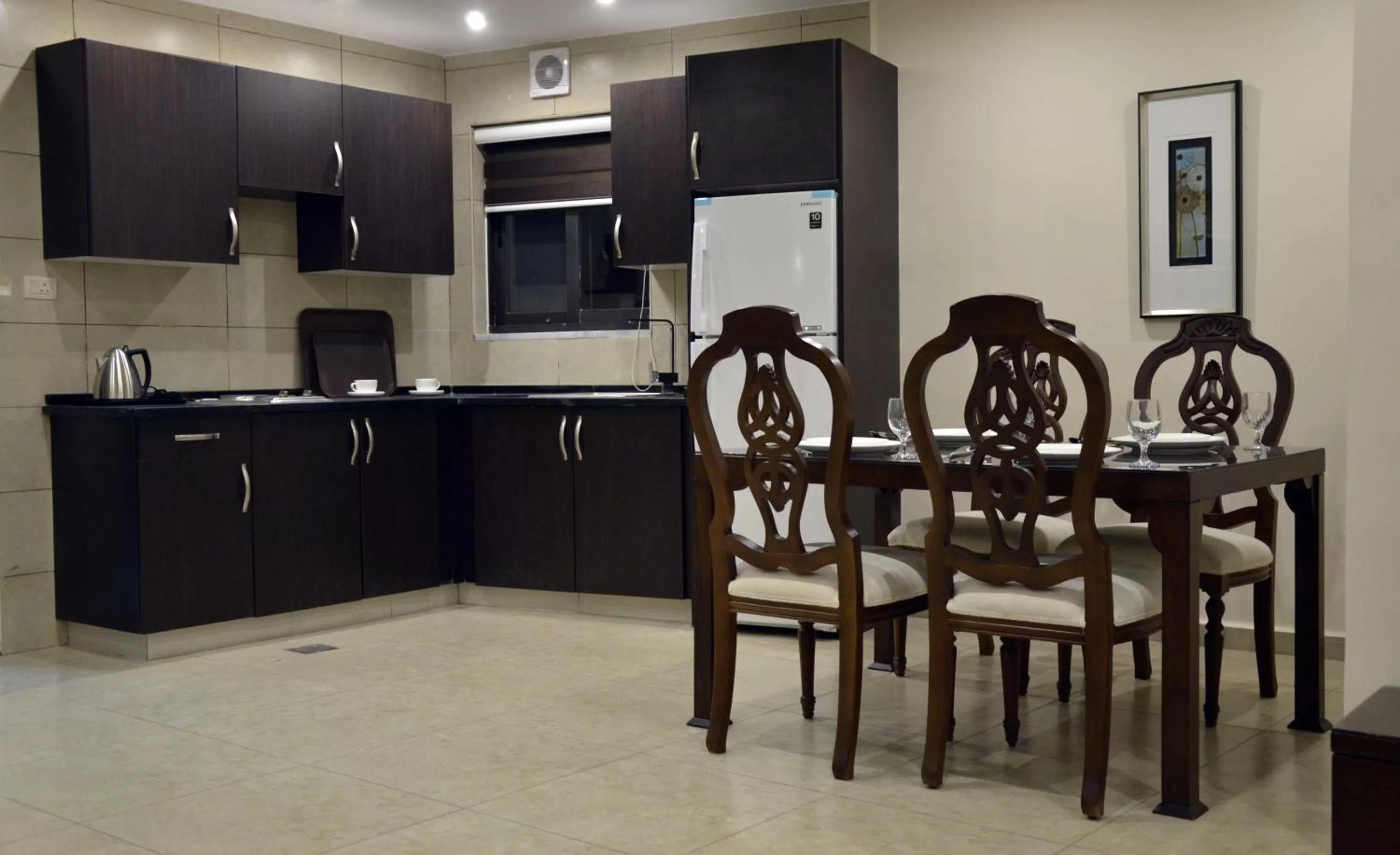 Kitchen or kitchenette in City Rose Hotel Suites