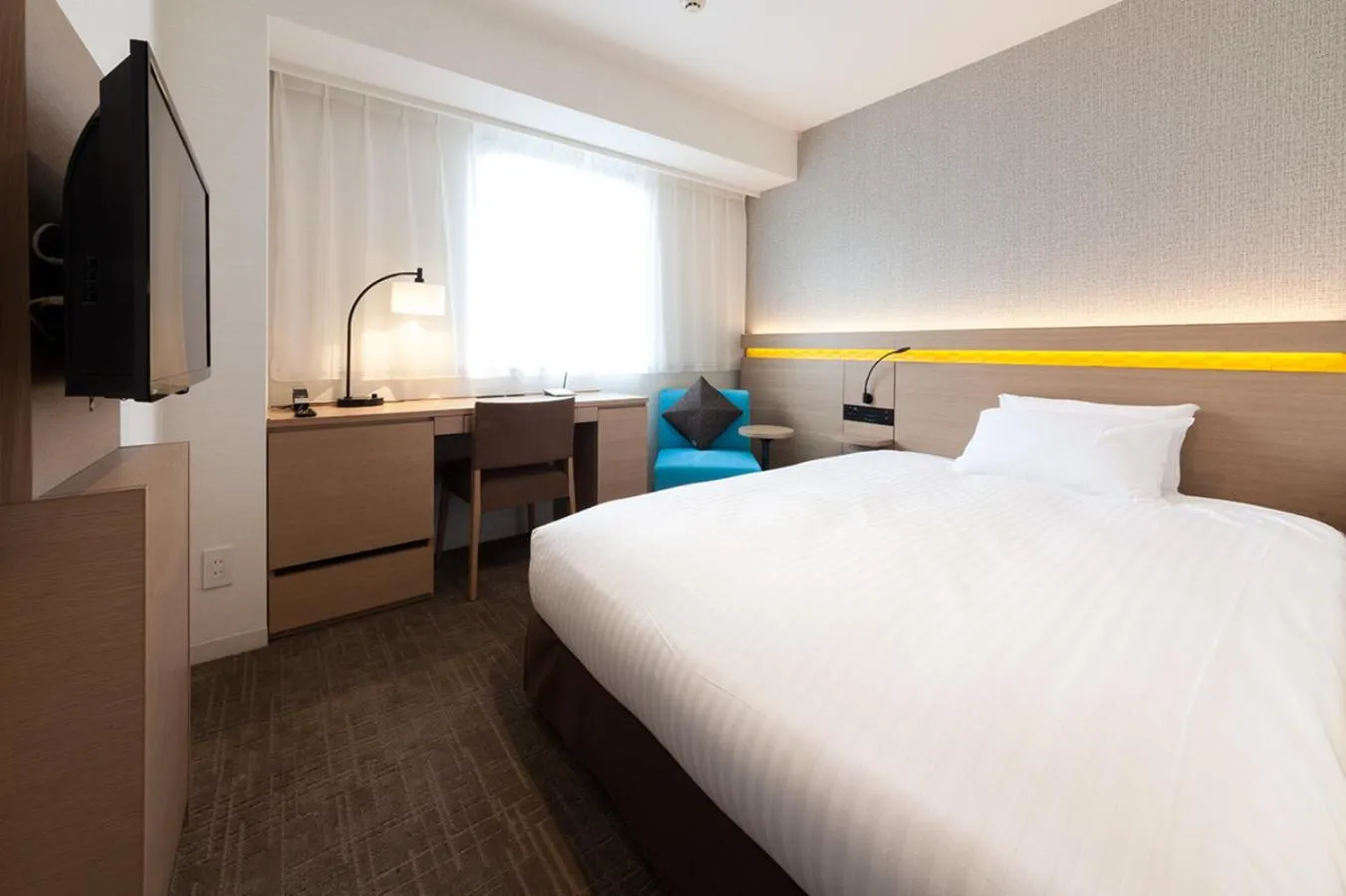 Photo of the whole room, Bed in Nishitetsu Hotel Croom Hakata