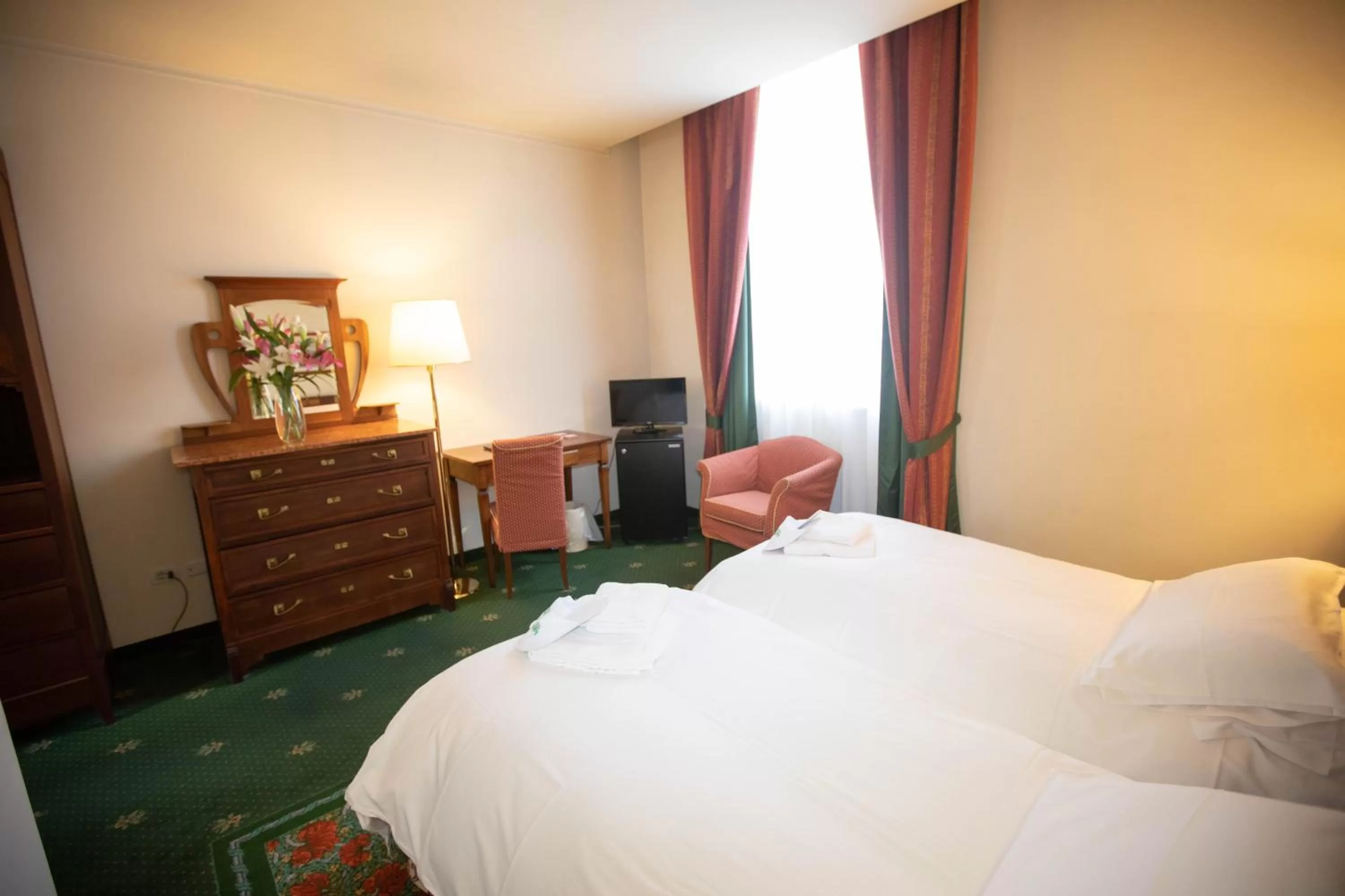 Bed in Hotel Candiani