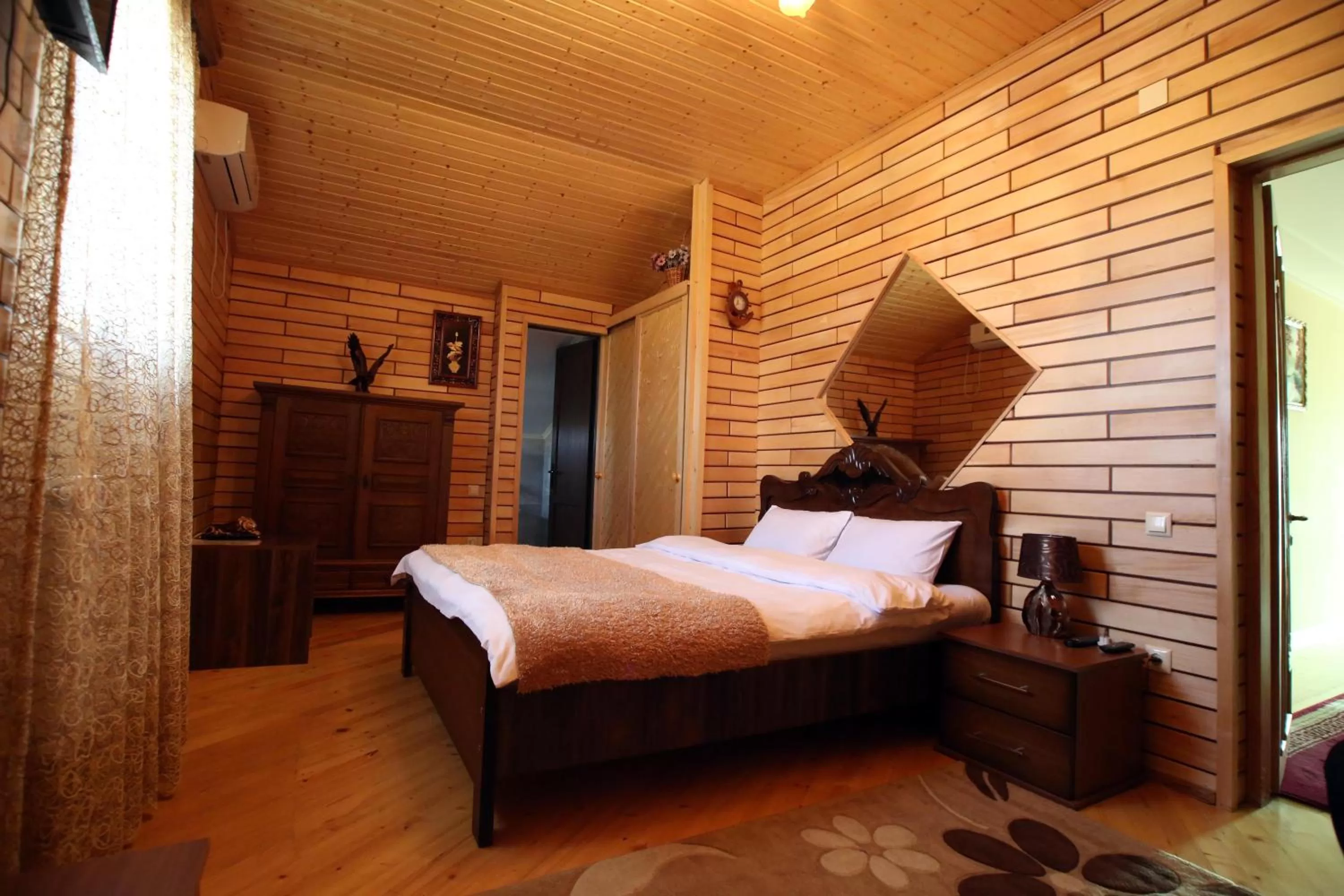 Living room, Bed in Hotel Harmony