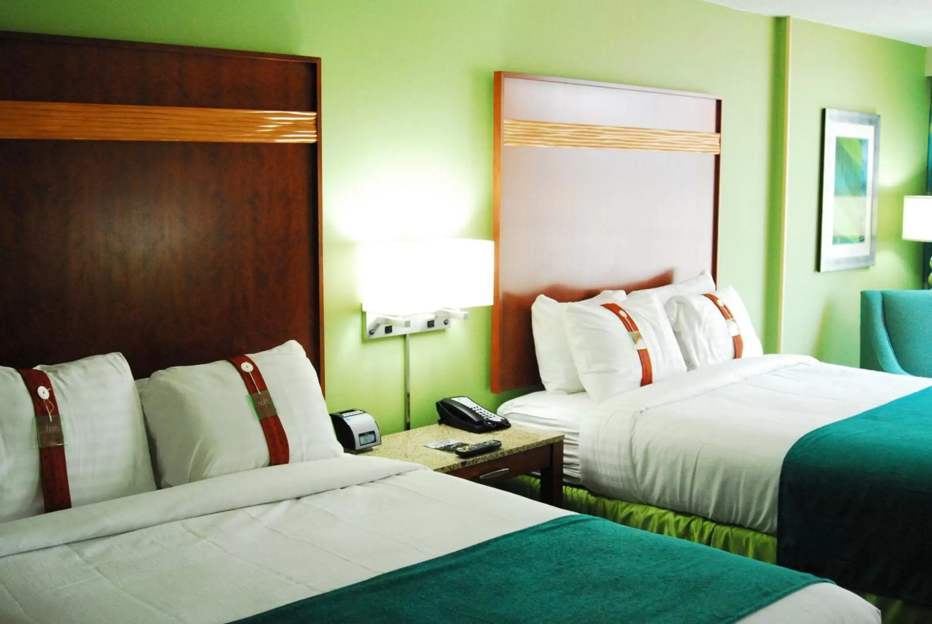 Bedroom, Bed in Holiday Inn & Suites Virginia Beach - North Beach, an IHG Hotel
