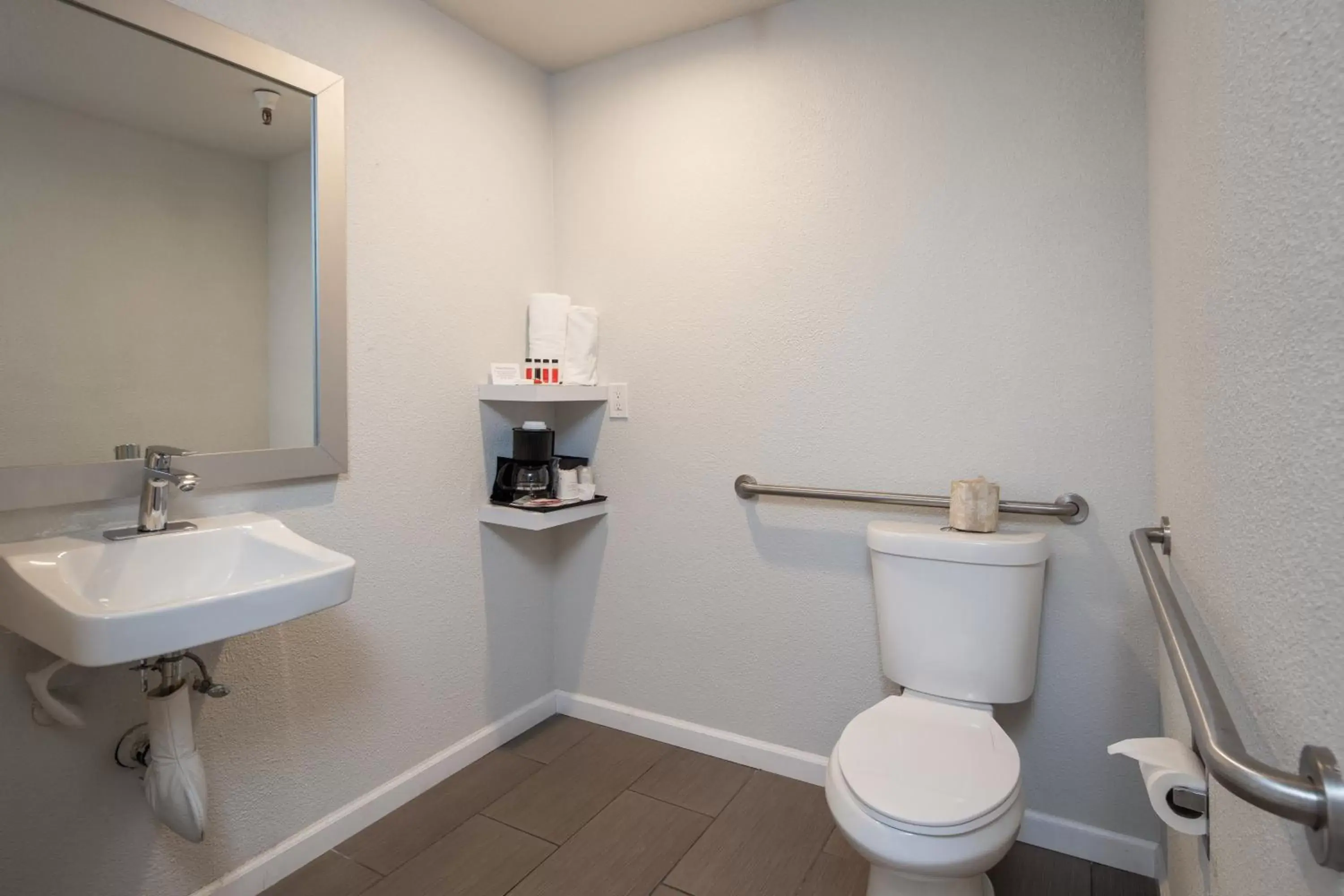 Toilet, Bathroom in Rodeway Inn