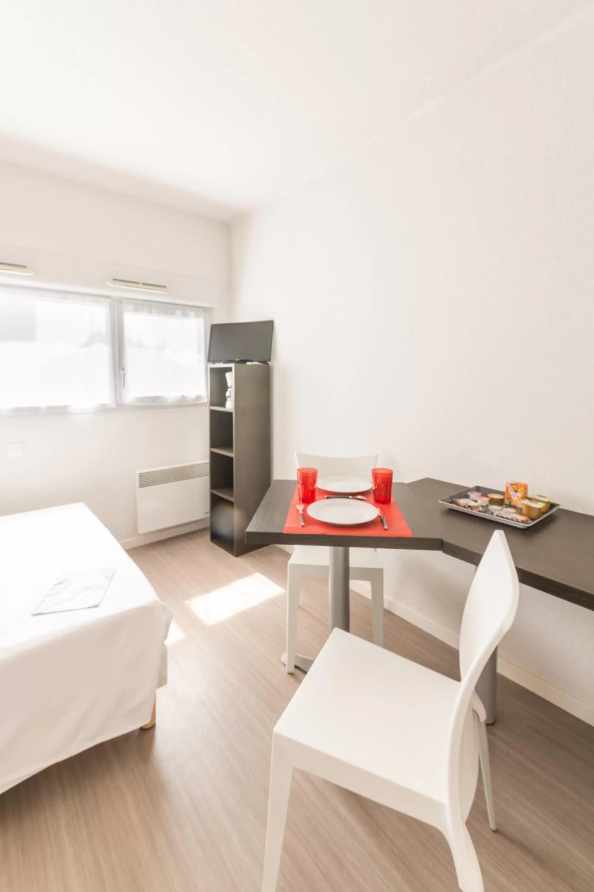 Dining area, Bed in City Résidence Nantes La Chantrerie
