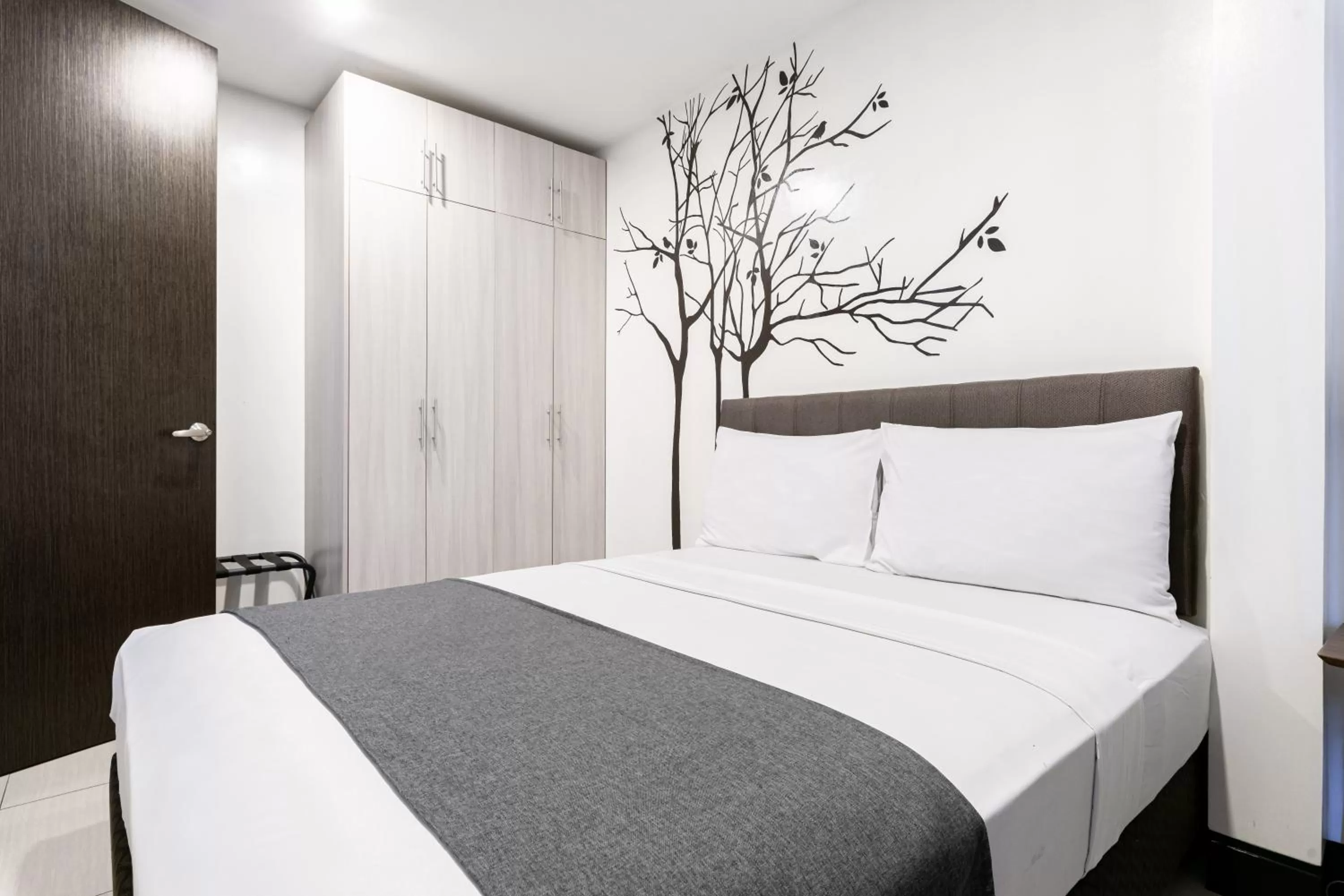 Bedroom, Bed in Artemis Place Makati Hotel