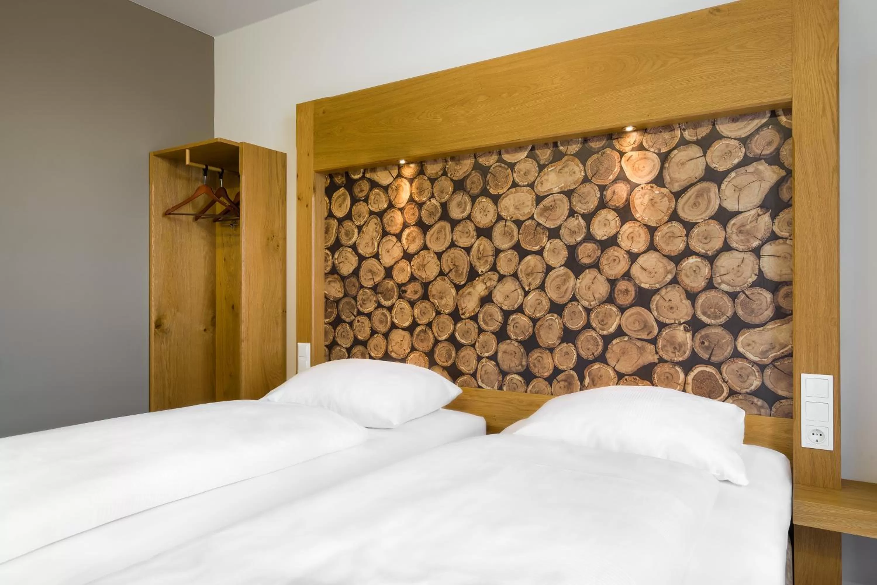 Bed in Atomis Hotel Dachau Munich