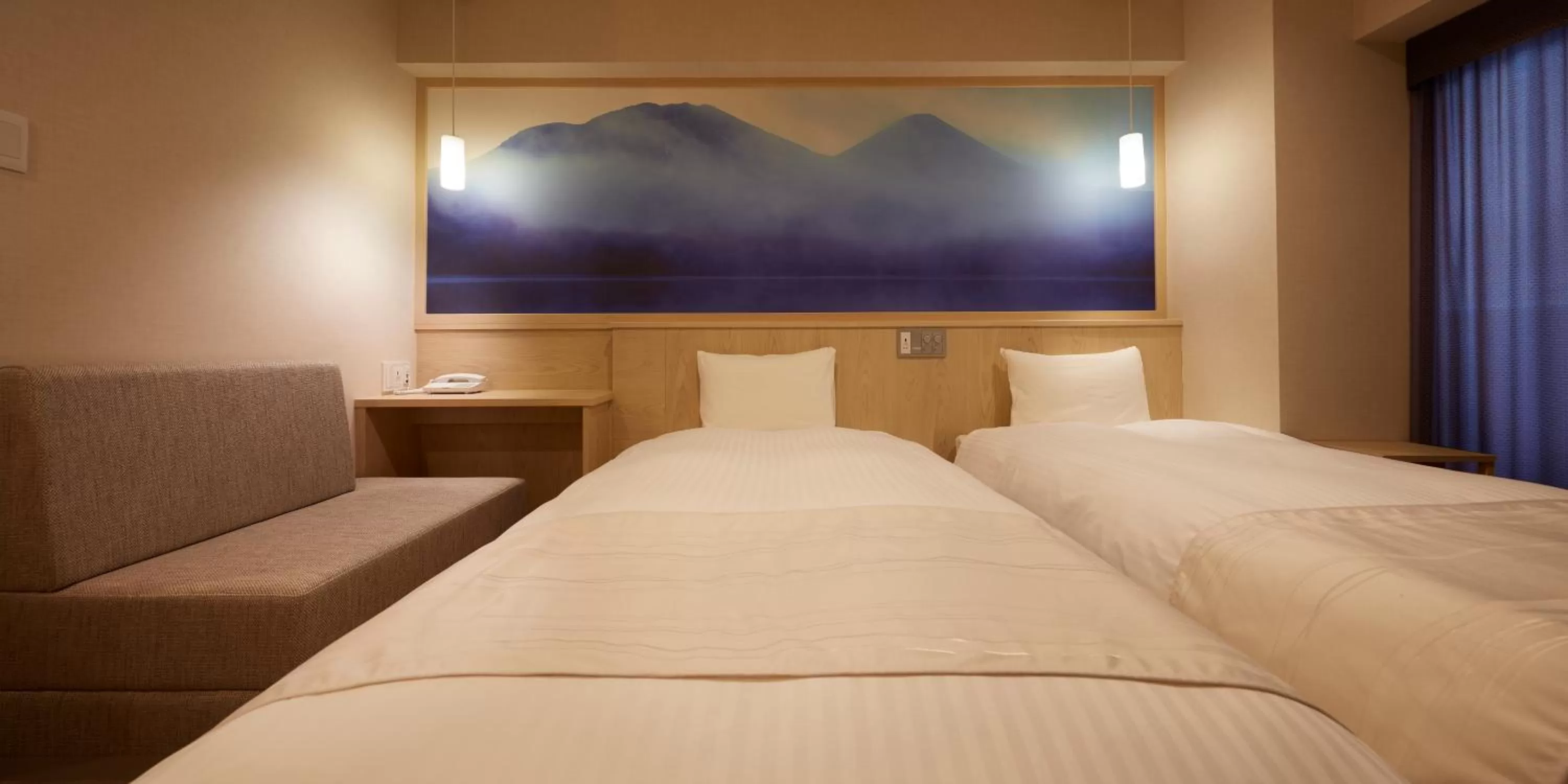 Bed in Sakura Sky Hotel