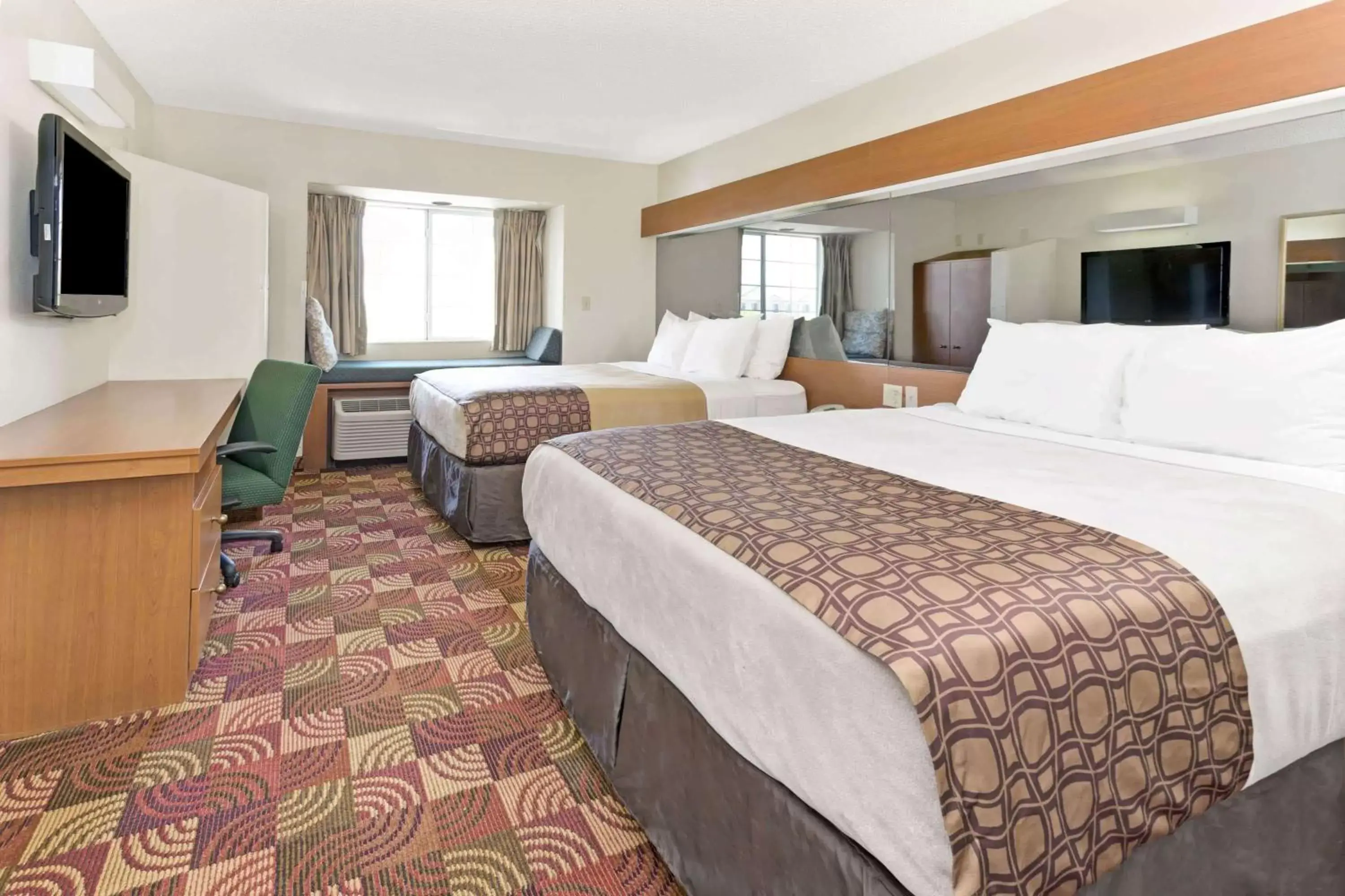 Photo of the whole room, Bed in Microtel Inn & Suites by Wyndham Denver Airport