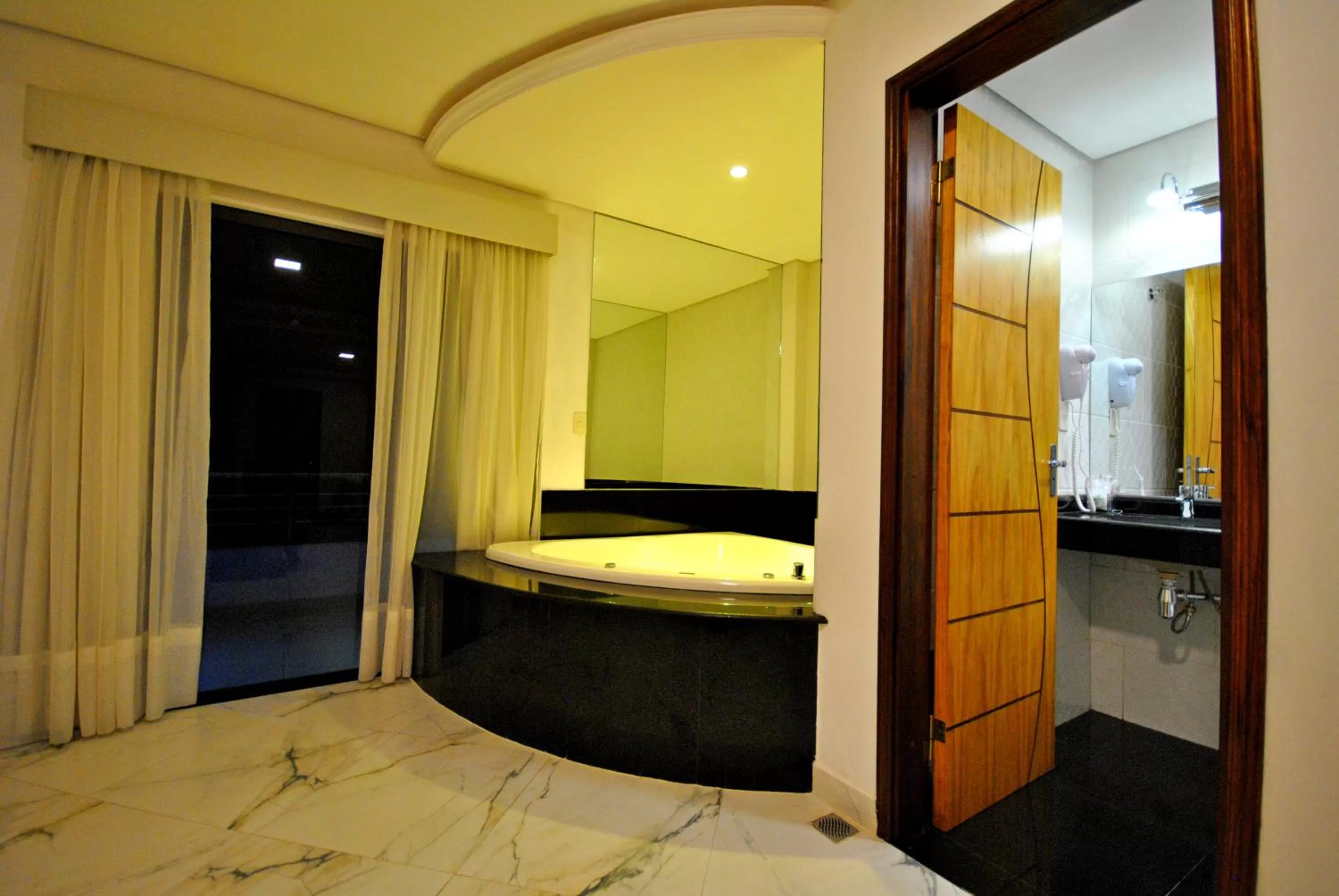 Bathroom, Bed in Los Lagos Resort Hotel
