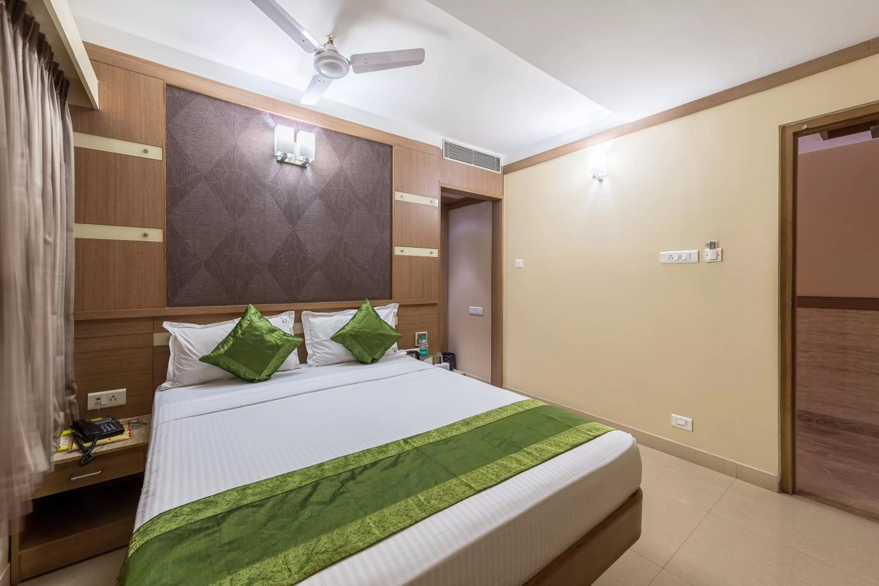 Bedroom, Bed in Treebo ESS Grande