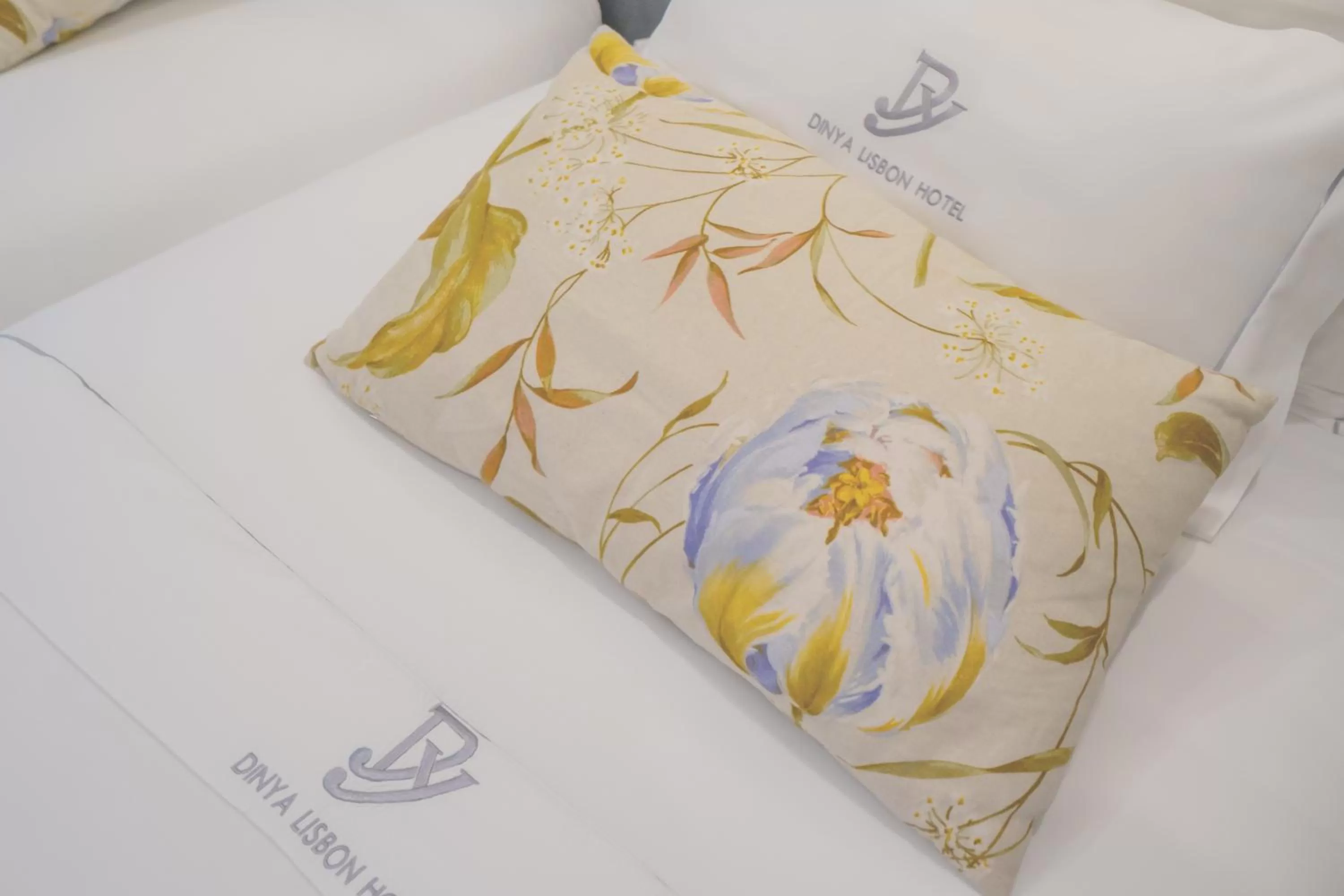 Bed in Dinya Lisbon Hotel