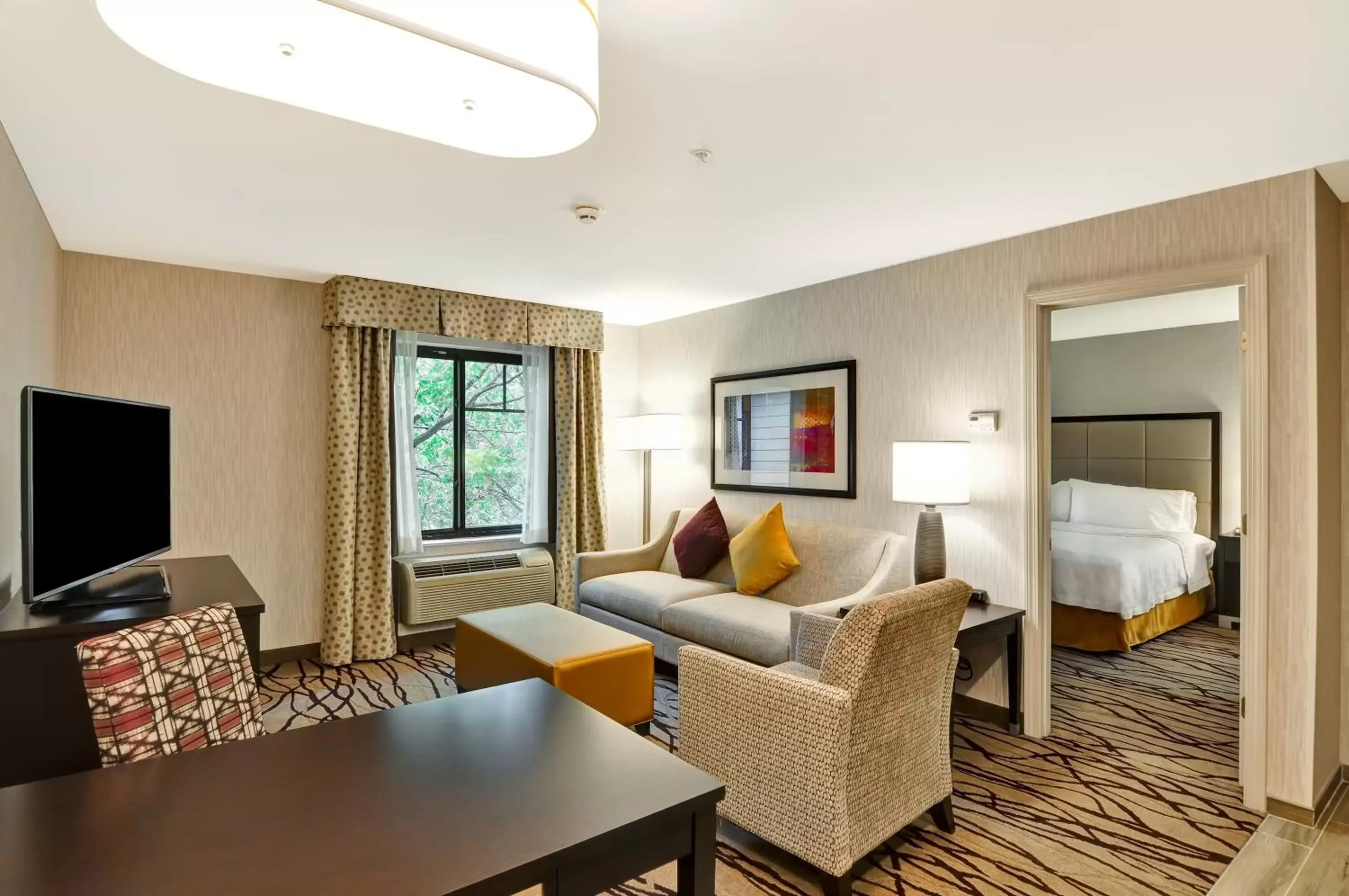 Bed, Seating Area in Homewood Suites by Hilton Boston Cambridge-Arlington, MA
