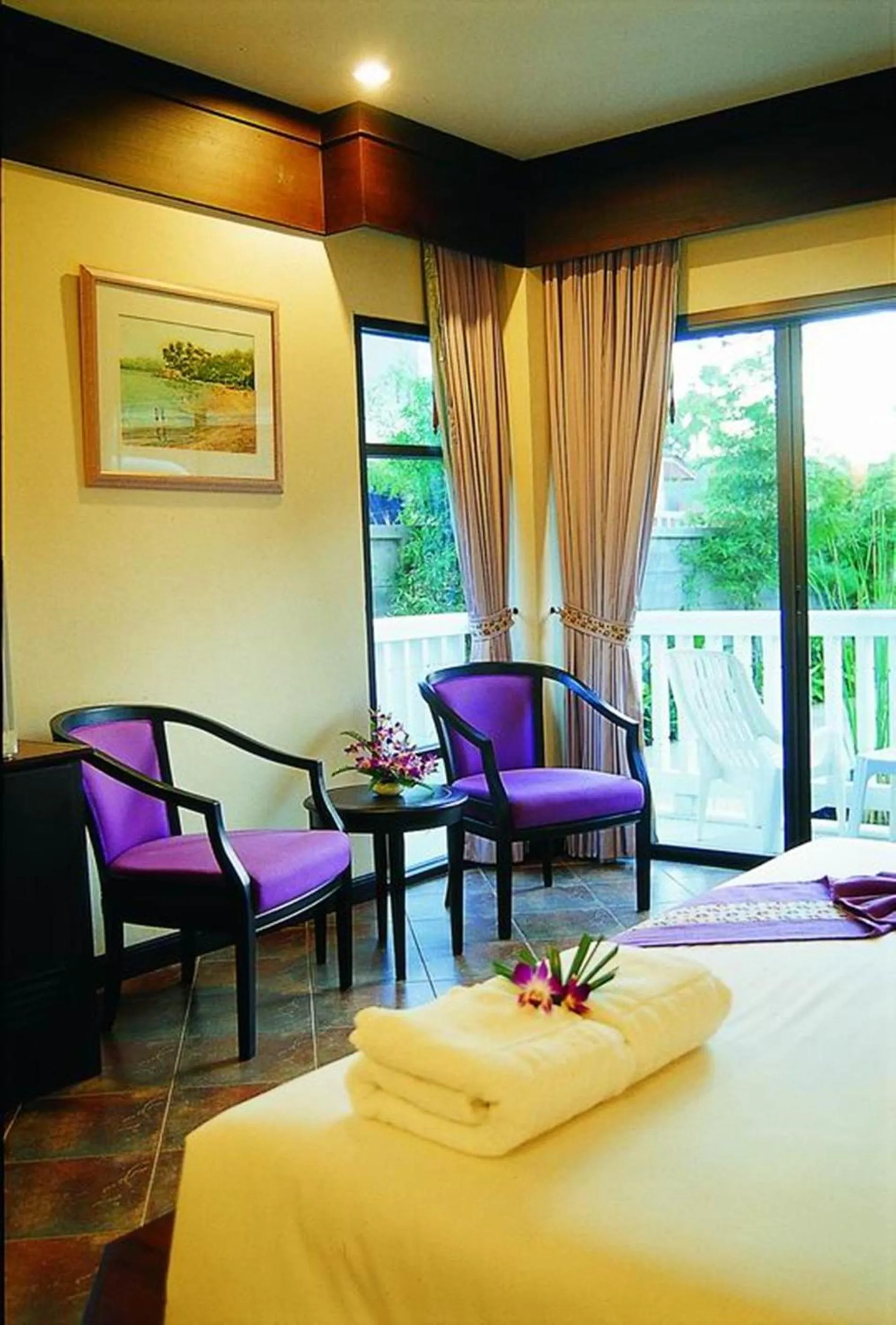 Seating area, Bed in Kata Poolside Resort SHA Extra Plus