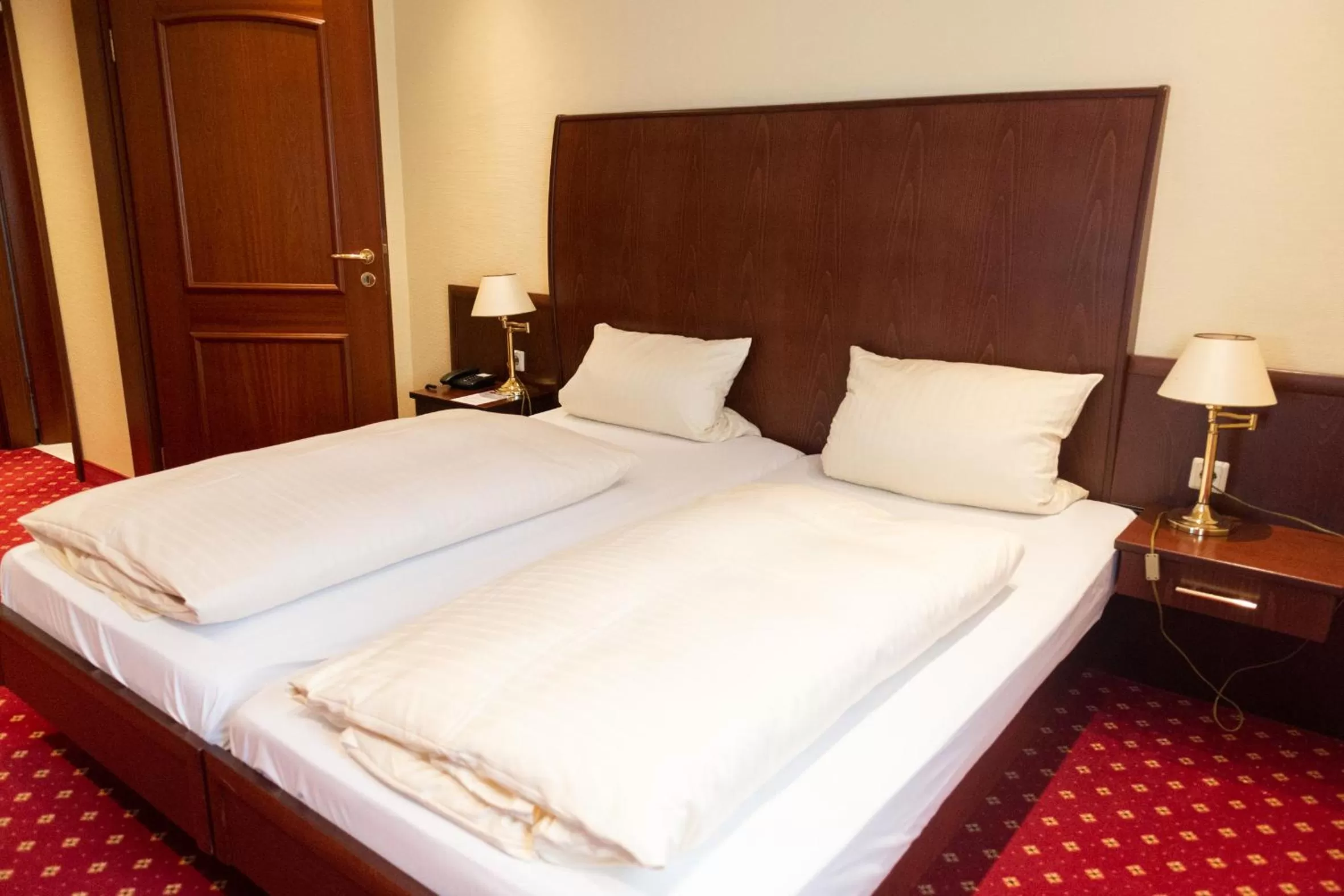 Bed in Hotel Haus am Zoo