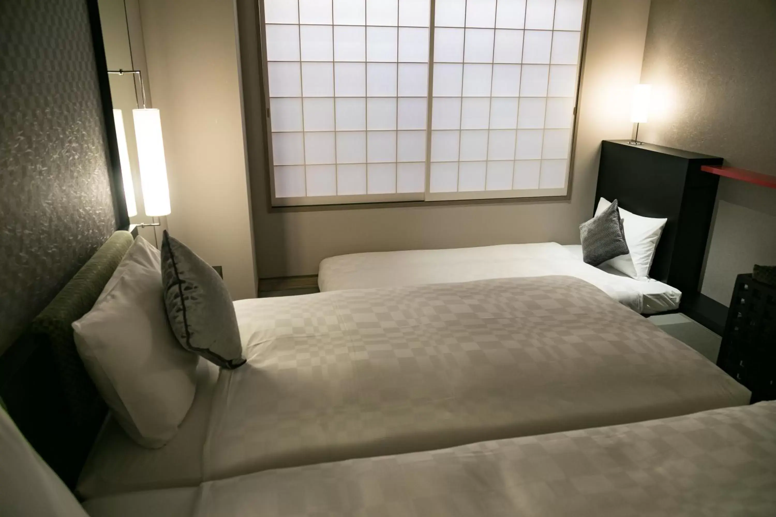 Bed in Hotel Resol Trinity Kyoto