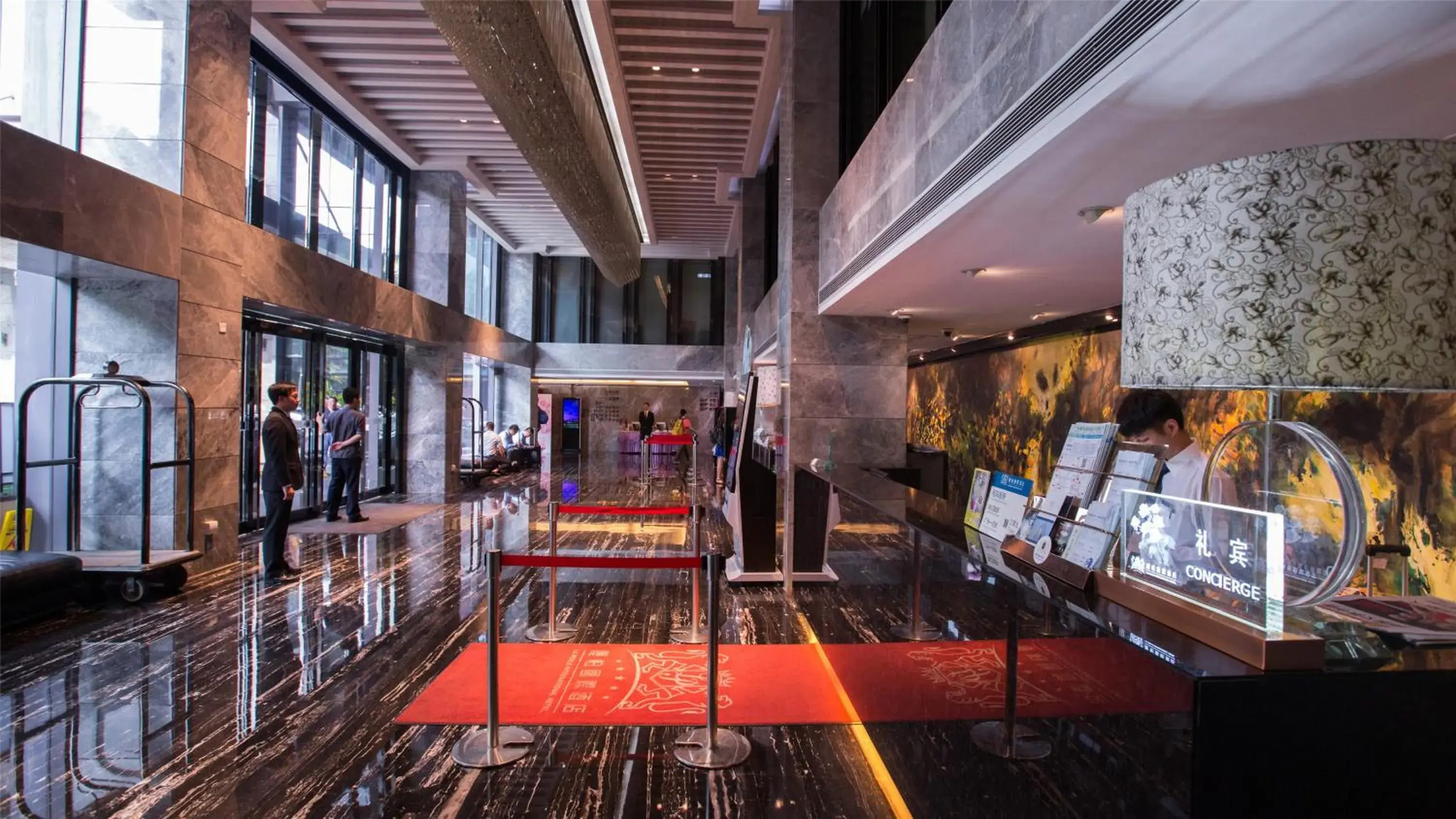 Lobby or reception in La Perle International Hotel