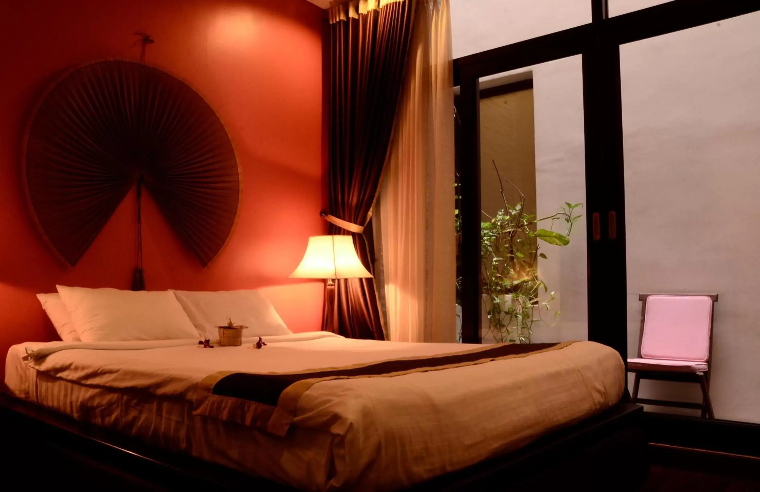 Bed in Nam Bo Boutique Hotel