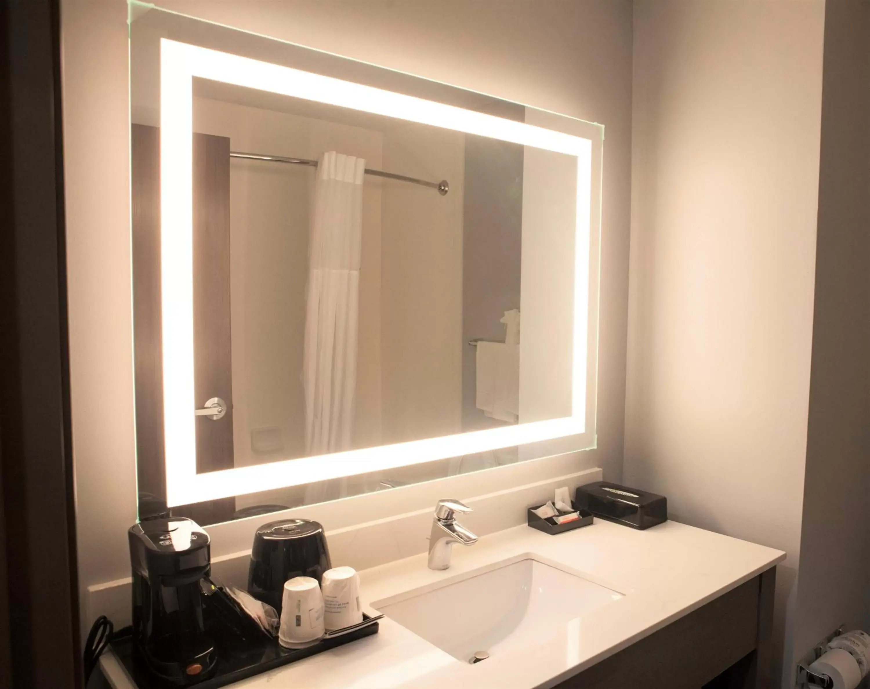 Bathroom in Days Inn & Suites by Wyndham Houston NW Cypress