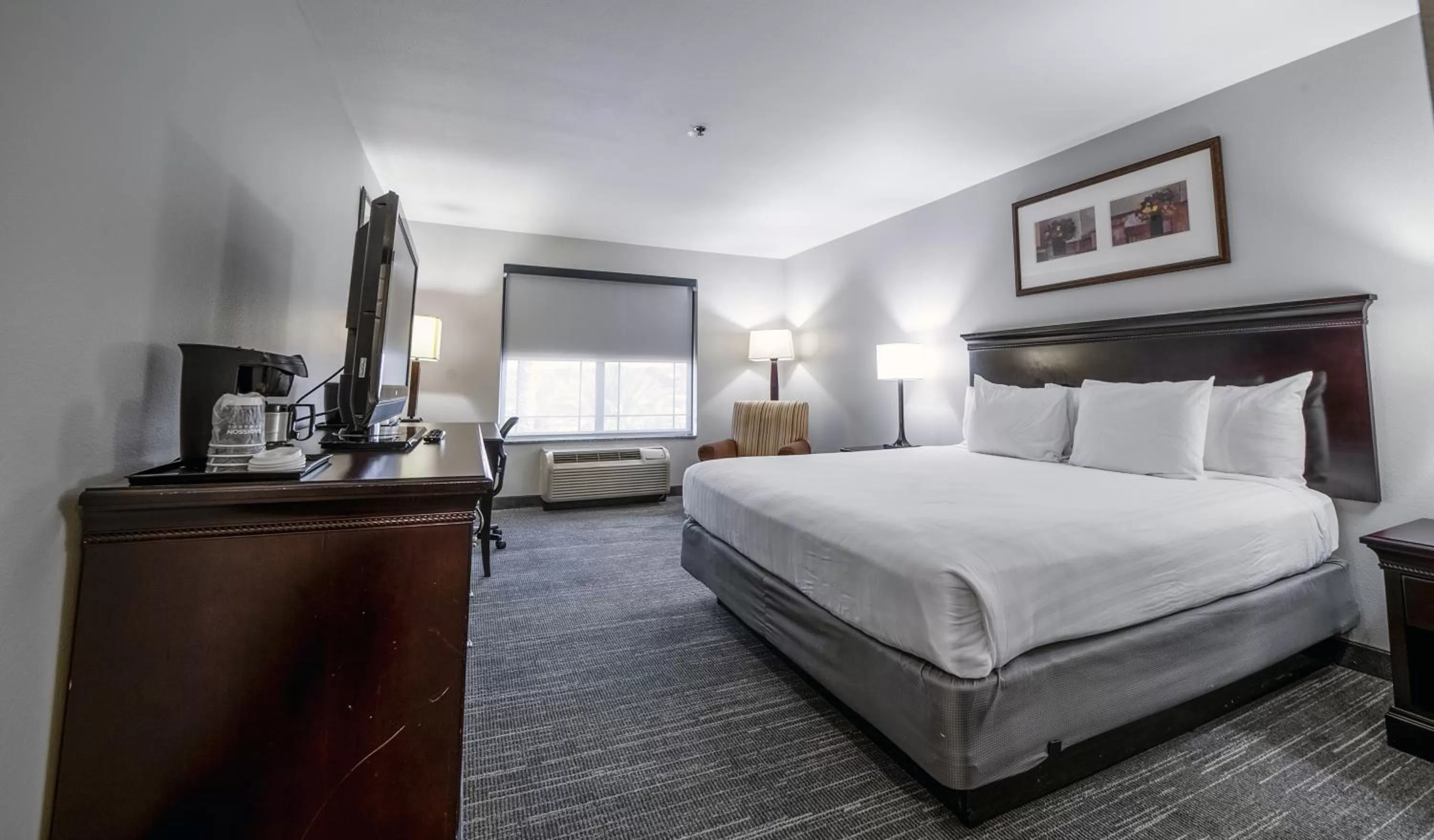 Bathroom, Bed in Country Inn & Suites by Radisson, Ontario at Ontario Mills, CA