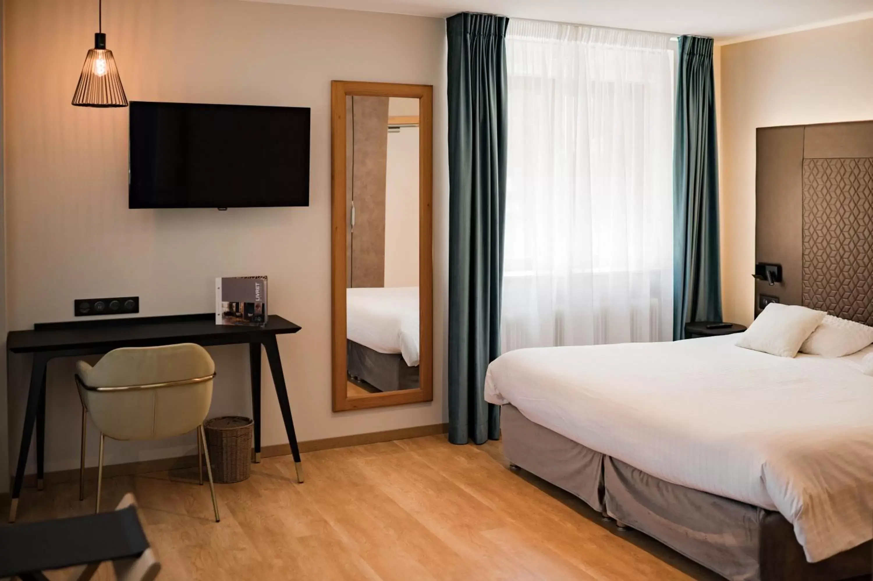 Bedroom, Bed in L'AO Hôtel & Restaurant L'Aigle d'Or Bedroom, Bed in L'AO Hôtel & Restaurant L'Aigle d'Or