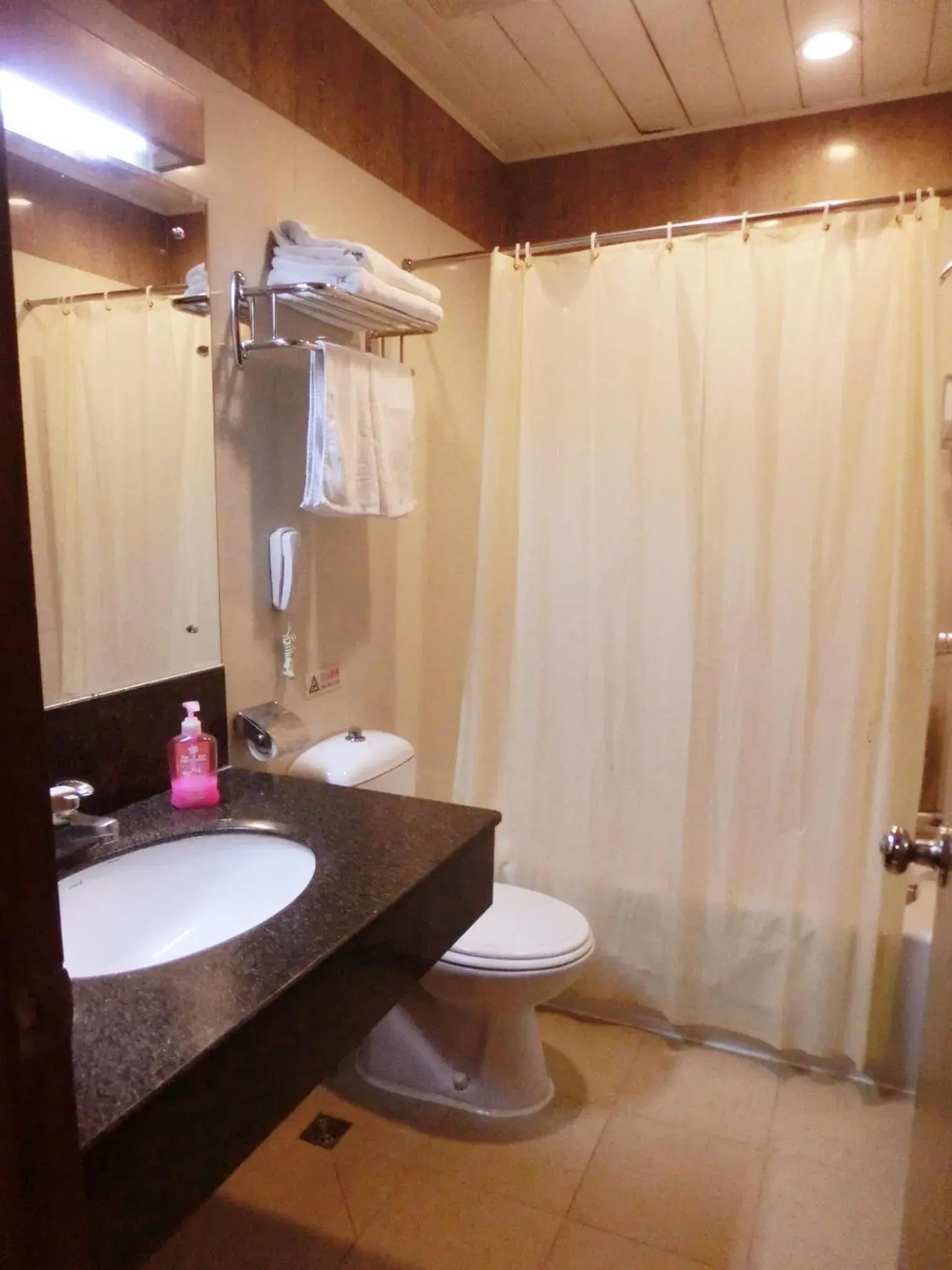 Toilet, Bathroom in New Asia Hotel