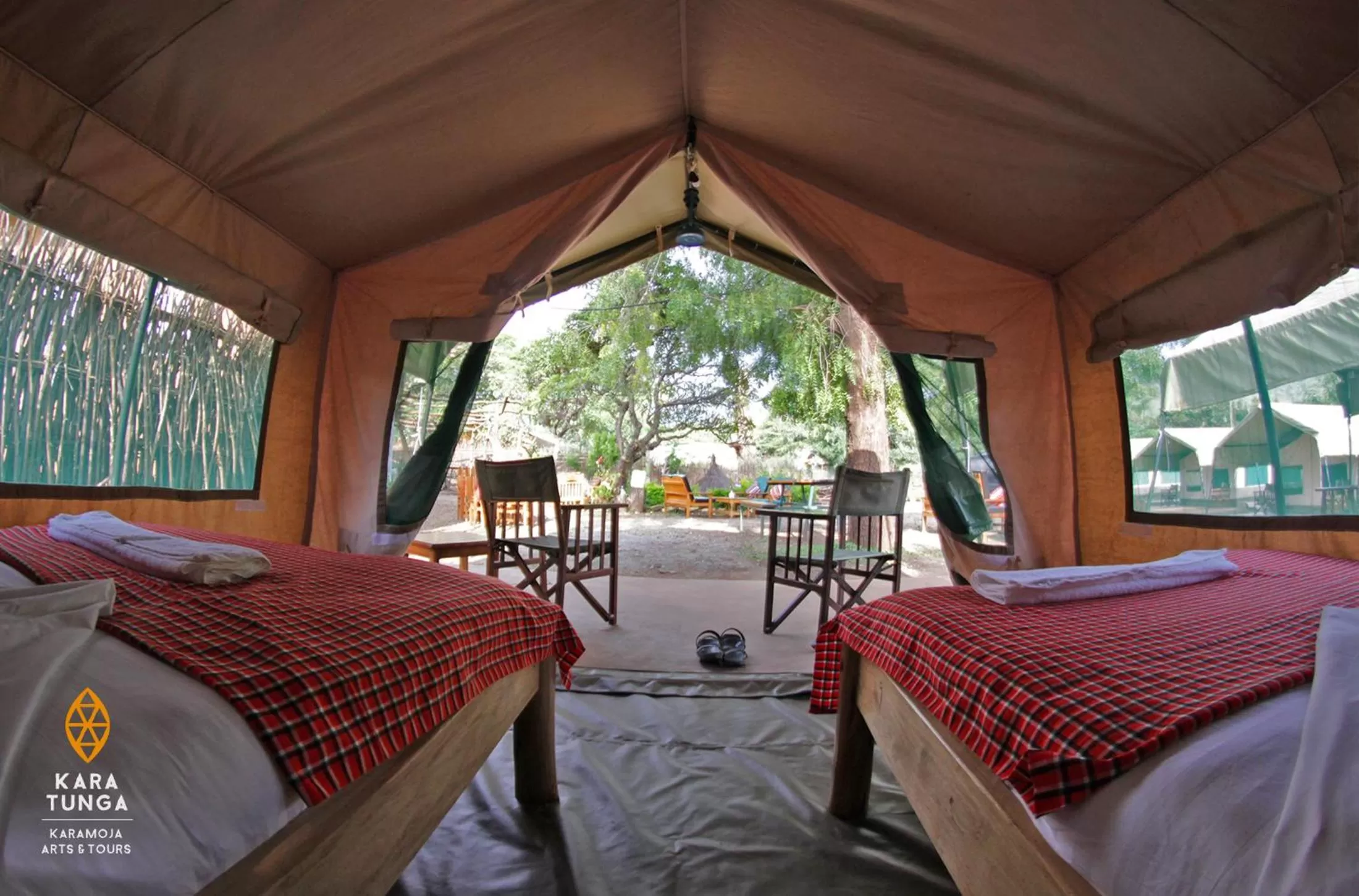 Bed in Kara-Tunga Safari Camp
